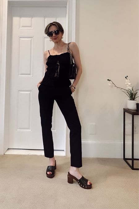 All black spring summer outfit! Black ankle slacks /trousers and ruched top. Slip on sandals that are super comfortable!