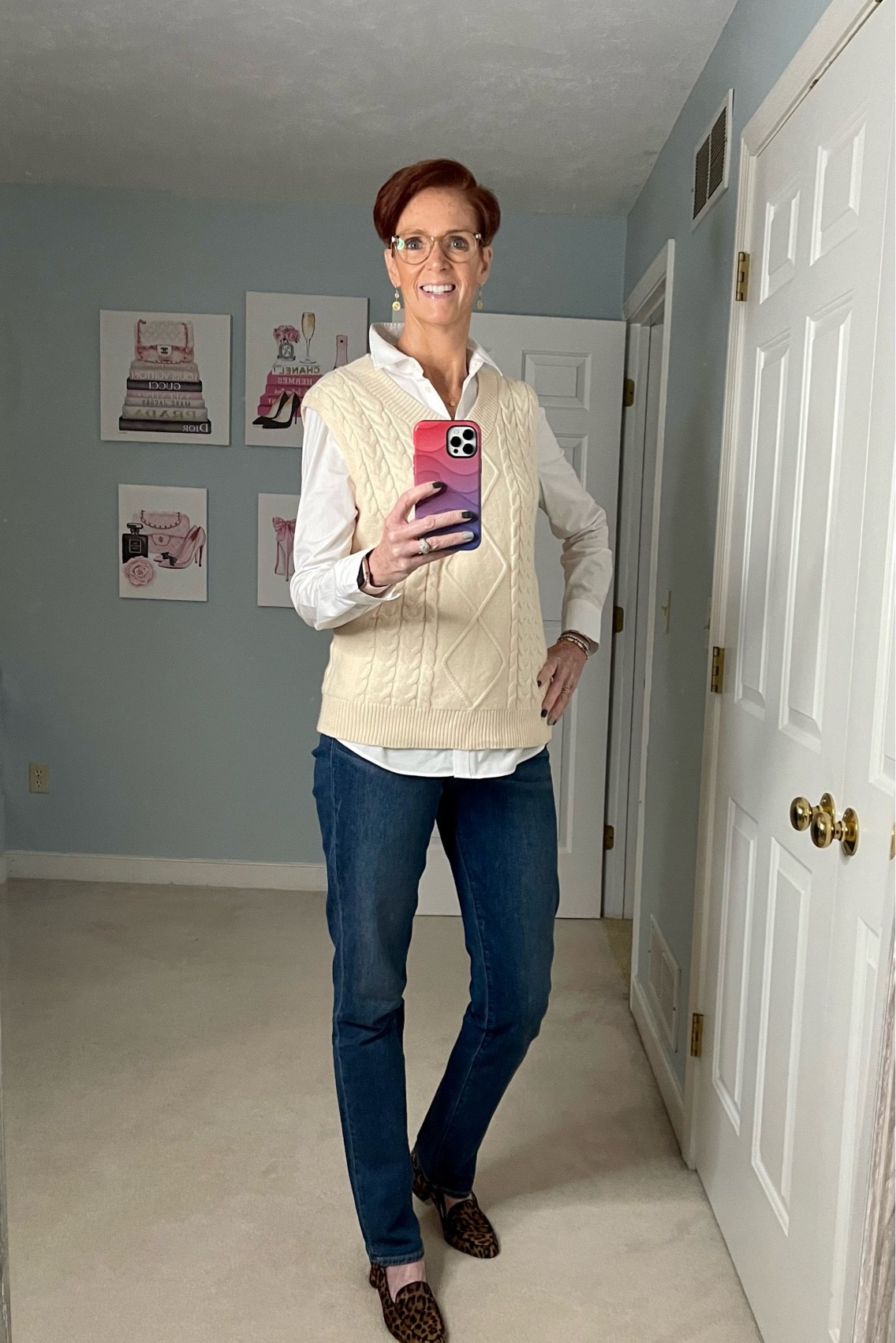 Classic outfit with a Tall friendly fitted white shirt in size 10 tall with knit vest in size medium and midrise tall jeans in a size 31.

Fall style, jeans, white button down, sweater vest, casual style, tall style