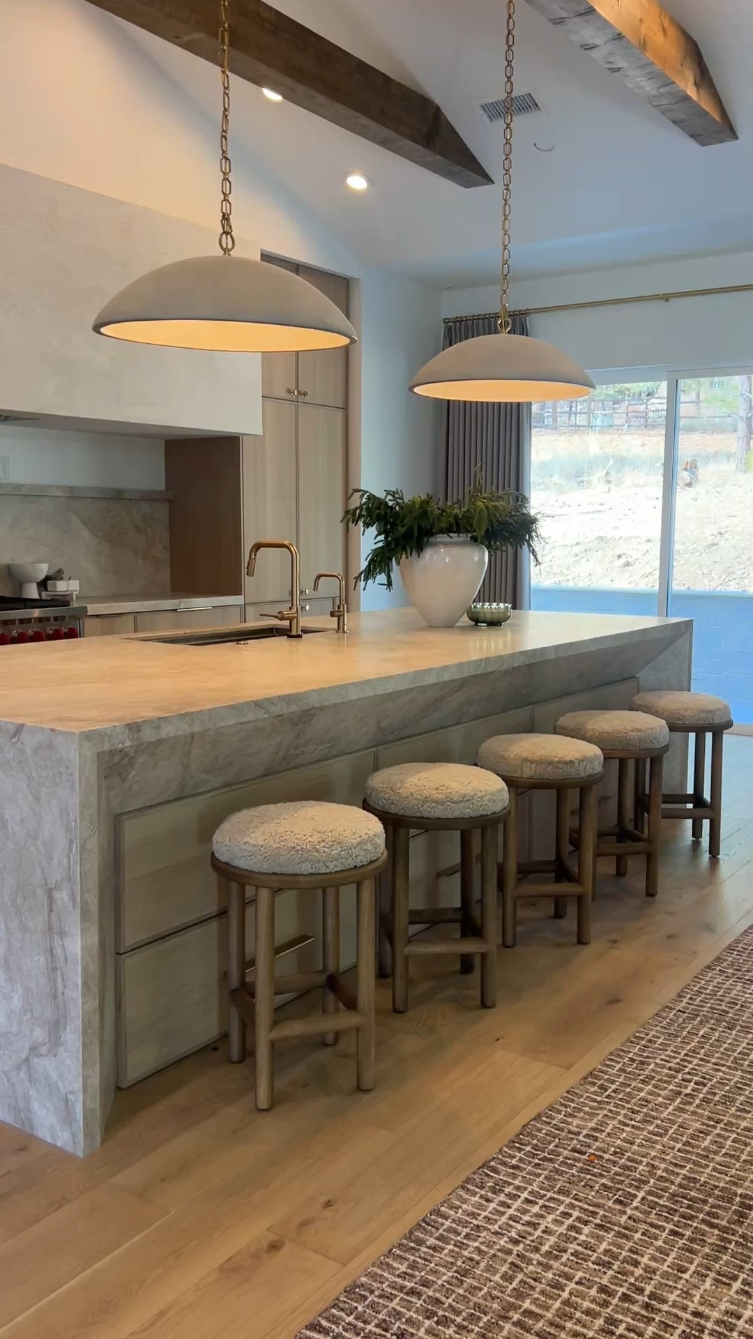 Still loving these pendants and counter stools in the Flagstaff home 

#LTKHome