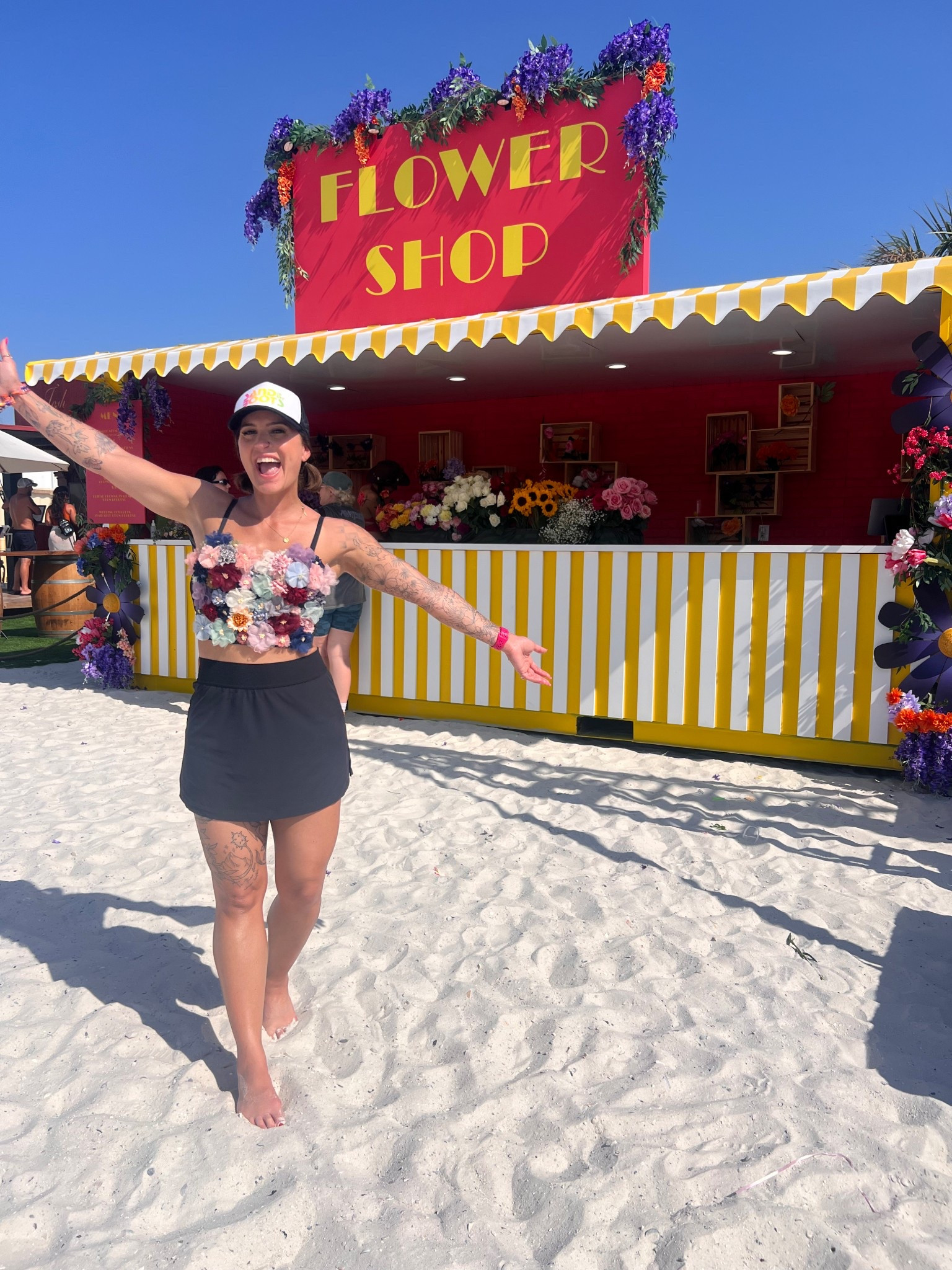 Had to get a picture in front of the flower shop in this top! I’m so obsessed with it. I’m wearing a medium  

#LTKSeasonal #LTKStyleTip #LTKFindsUnder100