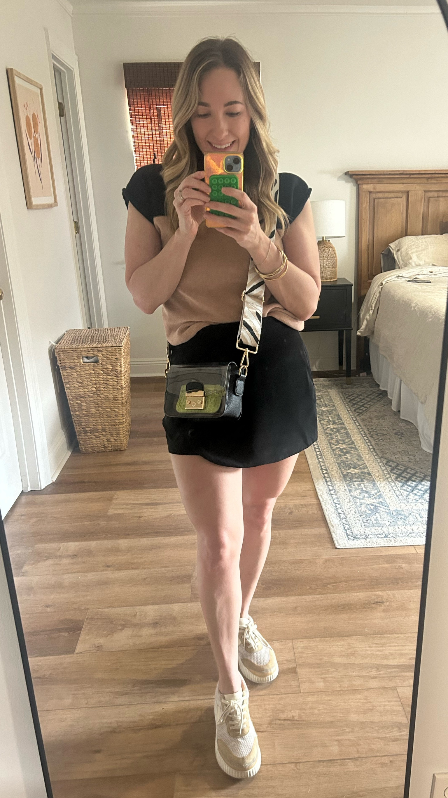 Saints game ready in my black and gold! This clear purse has been great for concerts and games - I change out the strap for some added team spirit. 

#LTKStyleTip #LTKItBag #LTKFindsUnder50