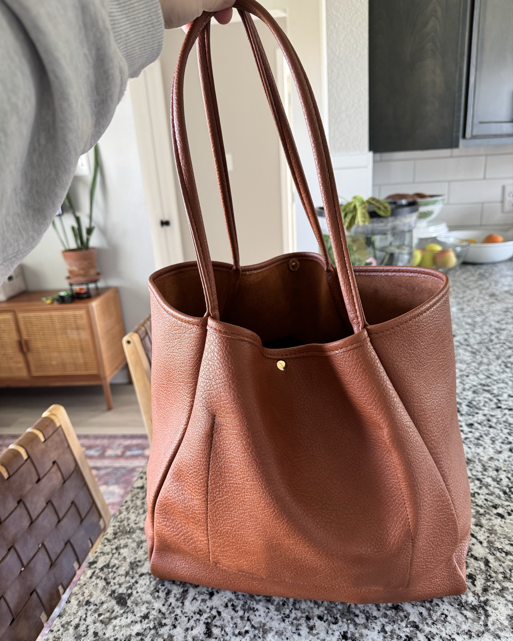 The best multi-functional mom bag I’ve ever owned! It fits more than a diaper bag (truly never full) and looks so high-end, but a small fraction of the price of designer bags the same size. 

I’ve been using it as a diaper bag for over a year now, but it would also be great as a carry on, a travel tote, a work bag, or gym bag. 

#LTKmomlife #LTKHome #LTKBaby