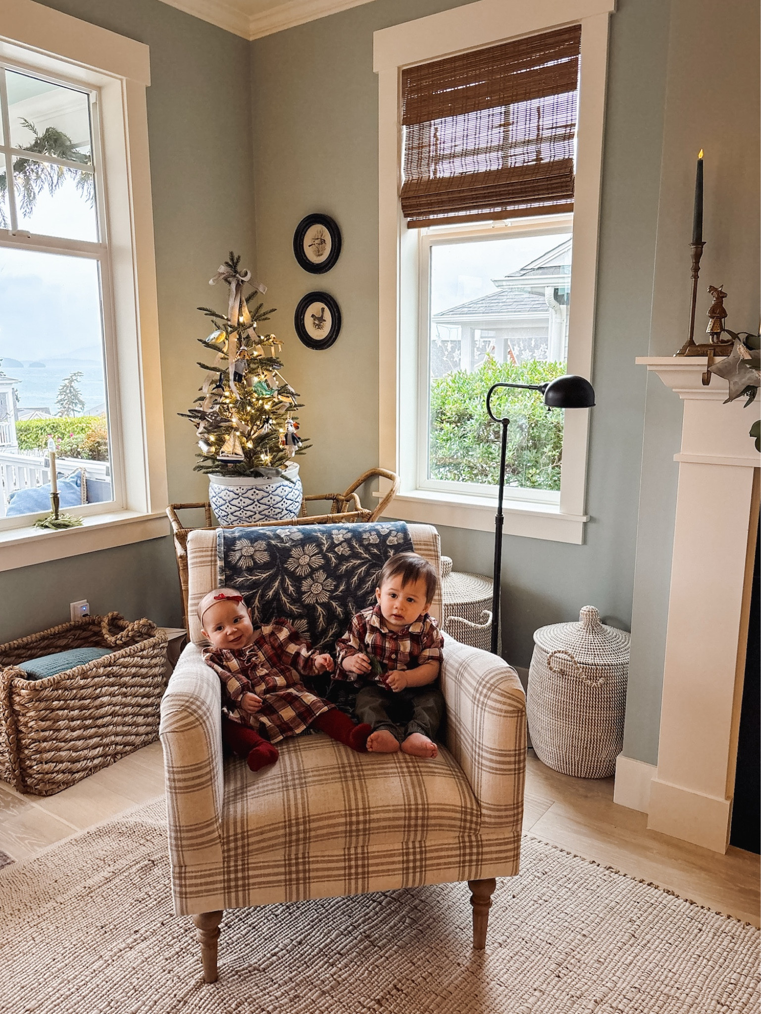 Living room sources- shades, plaid chair, jute and cotton rug, baby plaid holiday dress and shirt, window candle, gold taper candle holder 

#LTKHoliday #LTKBaby #LTKHome