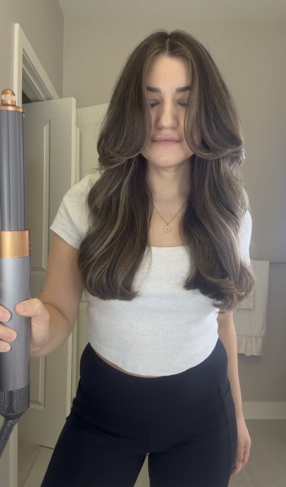 Here’s how I got this @dysonhair airwrap style to hold overnight:
1. Start with @unite_hair 7SECONDS detangling spray 
2. Add @oribe heat shield 
3. Rough dry hair about 85% of the way focusing on the roots only. If the ends are too dry, the hair won’t wrap around the airwrap properly. Keep a spray bottle nearby so you can add water if they dry as you’re styling (once you get faster at styling, you won’t need to do this often!)
4. Section hair in two. Add @colorwowhair XL bombshell volumizer
5. Start with the 1.6 barrel on the bottom pieces. Rotate the direction of the curl so that you’re curling away from your face. Cool shot 10 seconds after every curl.
6. For the top, use the 1.6 barrel on everything but the very front pieces. Switch to the smaller barrel for the hair that frames your face. 
7. For your fringe, use the round brush and cool shot 15 seconds.
8. Comb through with @thewetbrush pro 
9. Finish with @kenraprofessional volumizing spray 
10. Before bed, grab hair like you’re doing a low pony and then twist. Put up into a claw clip. This will hold the curl overnight so you can wake up looking just as gorgeous!
.
@dyson @dysonusa @dysonhairpro @ultabeauty @unite_hair @oribe @oribepro @kenraprofessional @thewetbrush 
#hair #hairstyle #hairstyles #hairtutorial #tutorials #dyson #dysonhair #dysonairwrap #mydyson #mydysonhair #hairtransformation #hairideas #blowout #blowoutstyles #airwrap #airwrapdyson #airwraptutorial #colorwow #colorwowhair #unite #unitehair #unitefamily #kenra #kenrahair #oribe #oribeobsessed #oribehair #hairroutine #hairtutorials #hairtutorialsvideos 

#LTKVideo #LTKstyletip #LTKbeauty