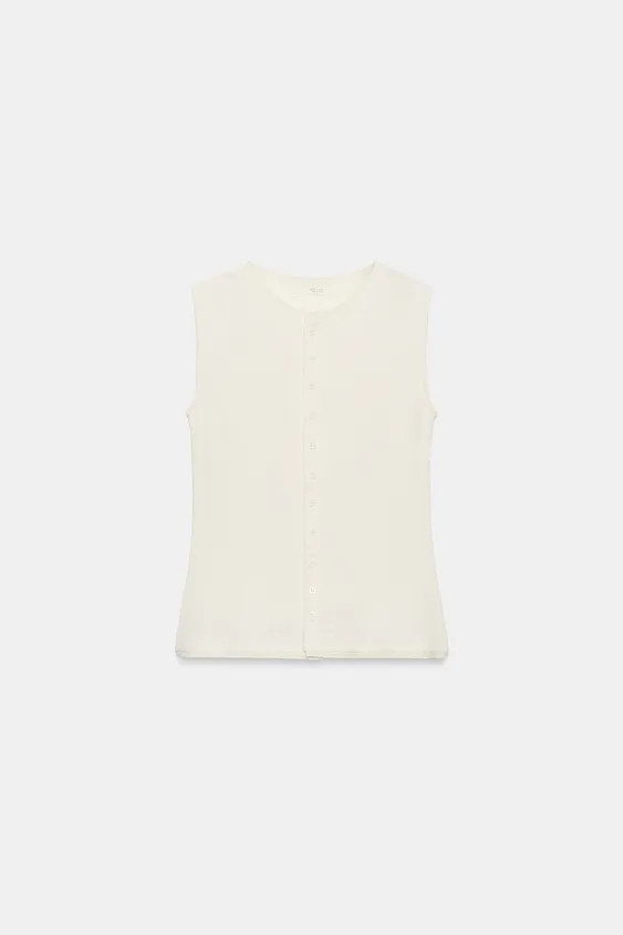 Waistcoat made from a viscose blend yarn. Featuring a round neck, sleeveless design, straight hem... | Zara UK