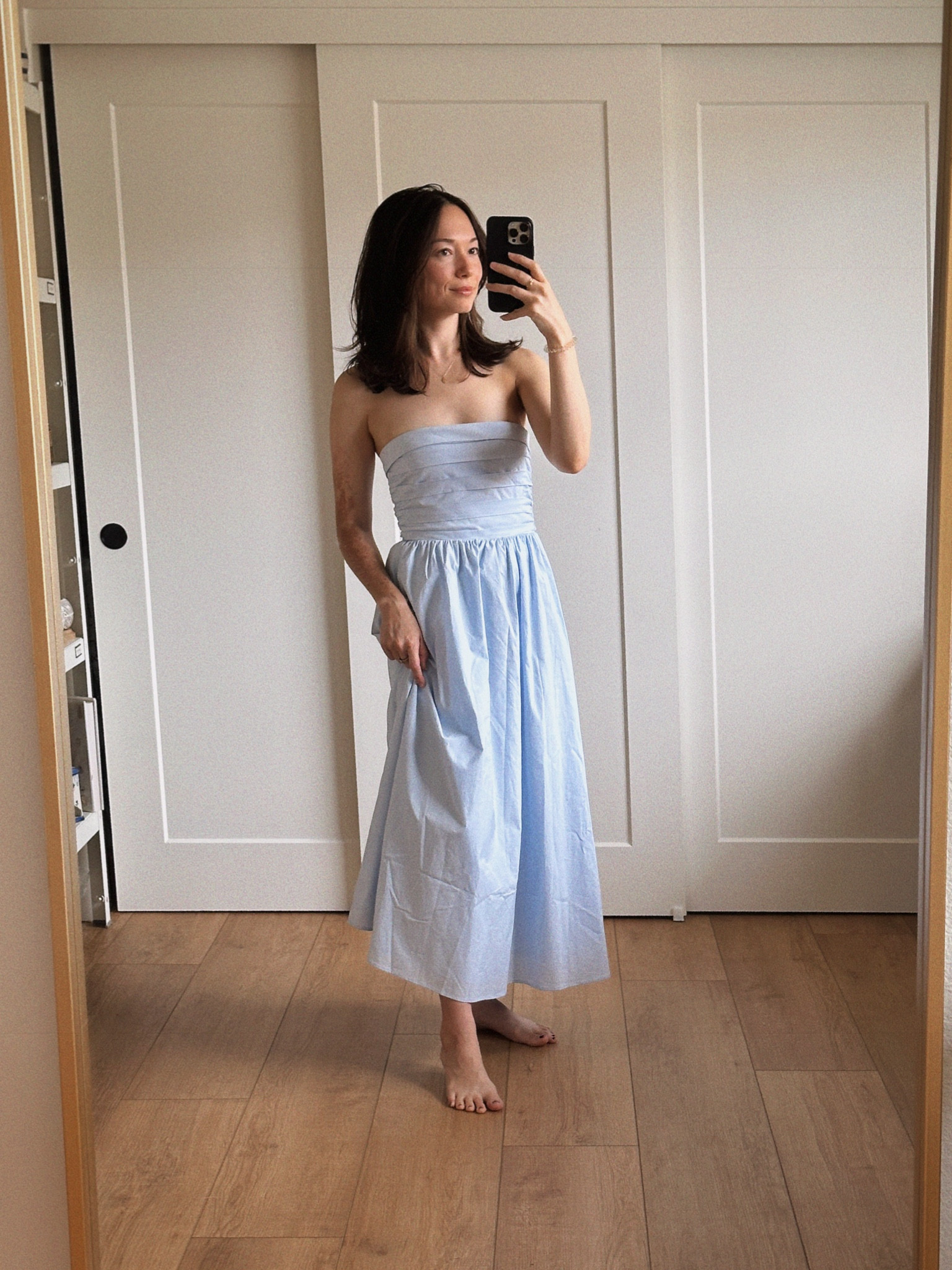 A light blue cotton sundress, perfect to wear as a wedding guest or spring outfit! 

#LTKFindsUnder100 #LTKWedding #LTKSeasonal
