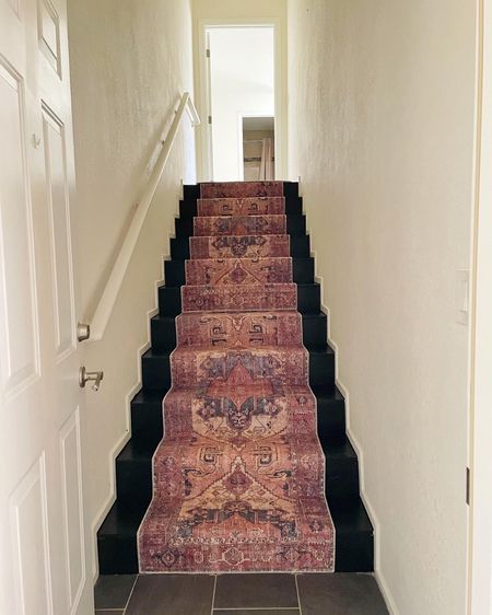 Staircase makeover!  A little black porch paint and a runner from Target gave this old carpeted staircase a new look for less.  #rug #runner #staircase 

#LTKunder50 #LTKunder100 #LTKhome
