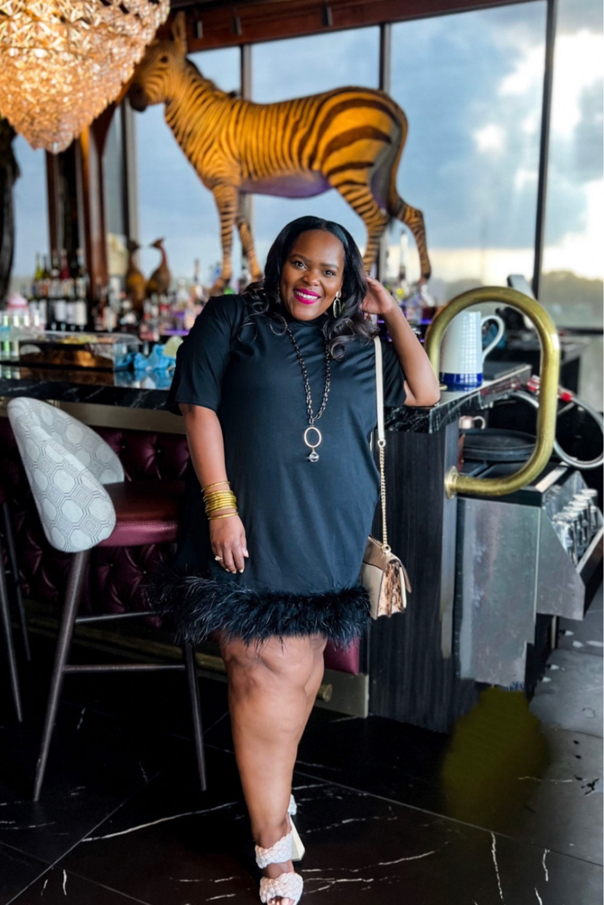 Black t-shirt dress with feather boa trim 🪶 wearing a size 2x / plus size dress / Fall wedding guest dress / black dress 

#LTKcurves #LTKwedding #LTKSeasonal