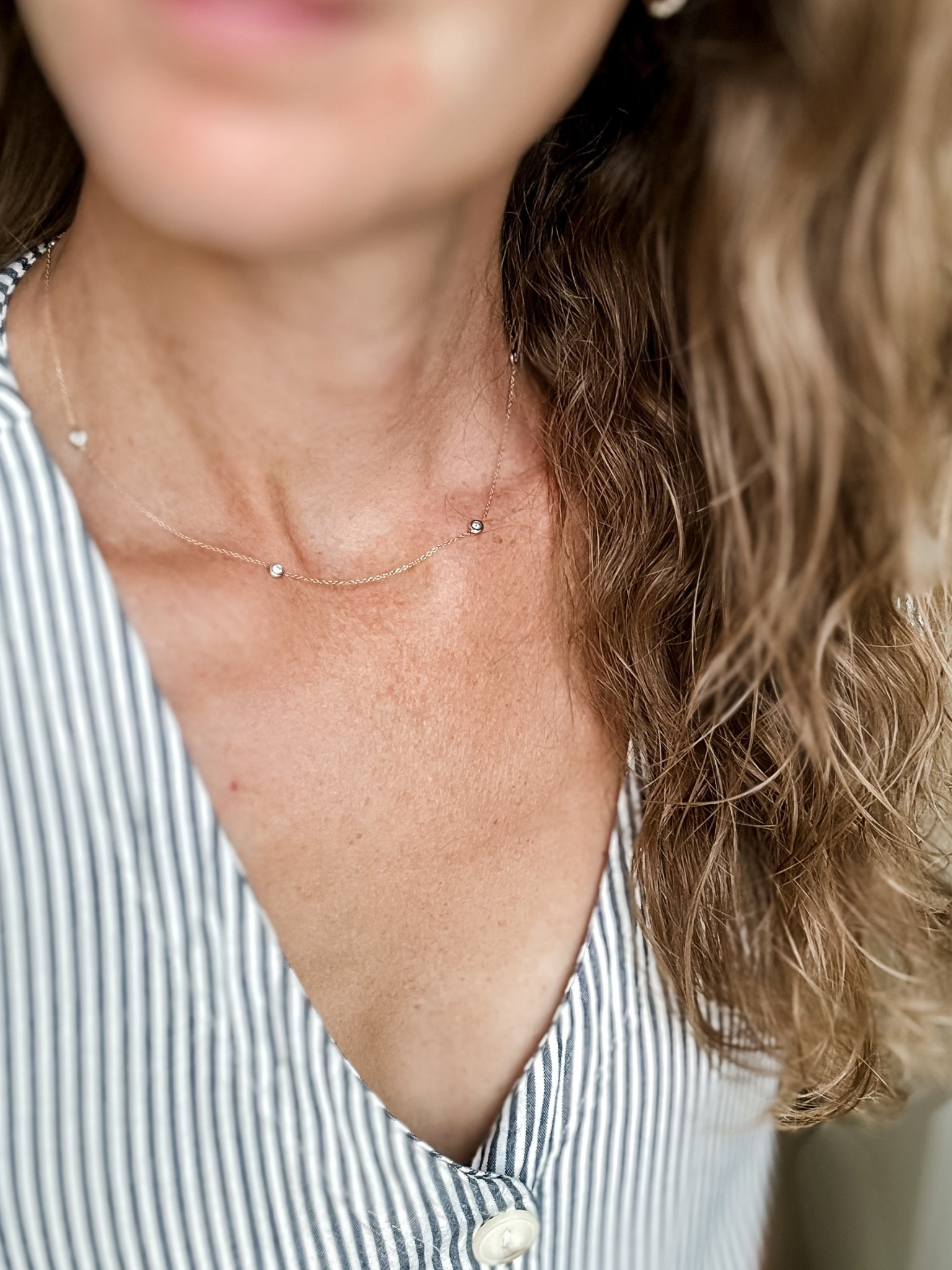 My necklace is a diamond by the yard from Ganem in Arizona, but I’ve found similar options online under $100 (not diamonds but CZ and look real!) 