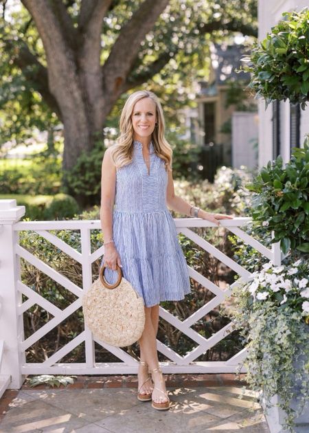 This is a great dress for summer!   

Blue and white striped dress 
Espadrilles 
Round straw bag with wooden handles 

#LTKSeasonal #LTKOver40 #LTKStyleTip