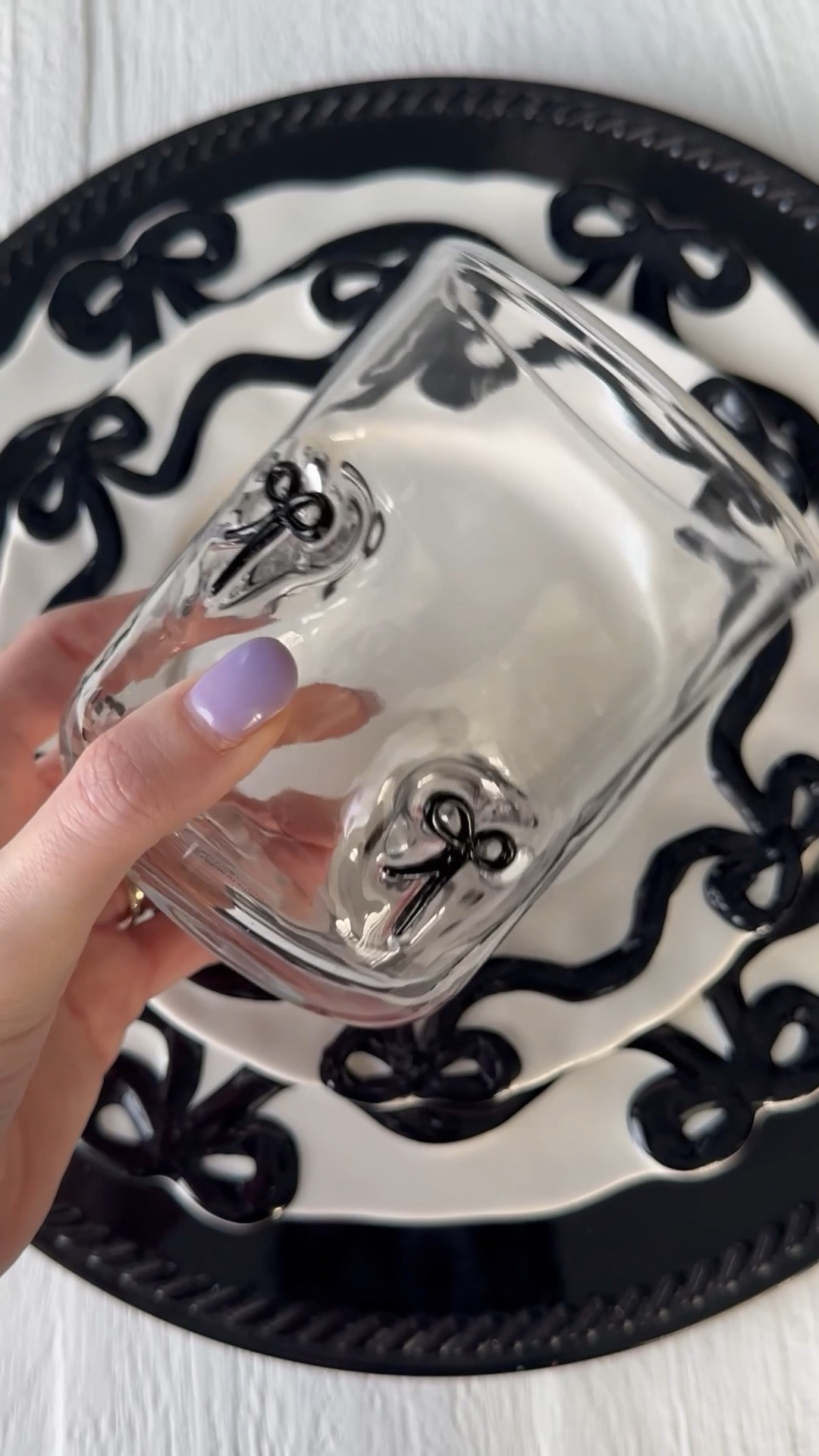 Anthropologie, Anthropologie home, dinnerware, tablescape, glassware, black bow, bows, anthro sale, home inspiration, table decor, dinner plates, cute glasses 

#LTKHome #LTKSpringSale