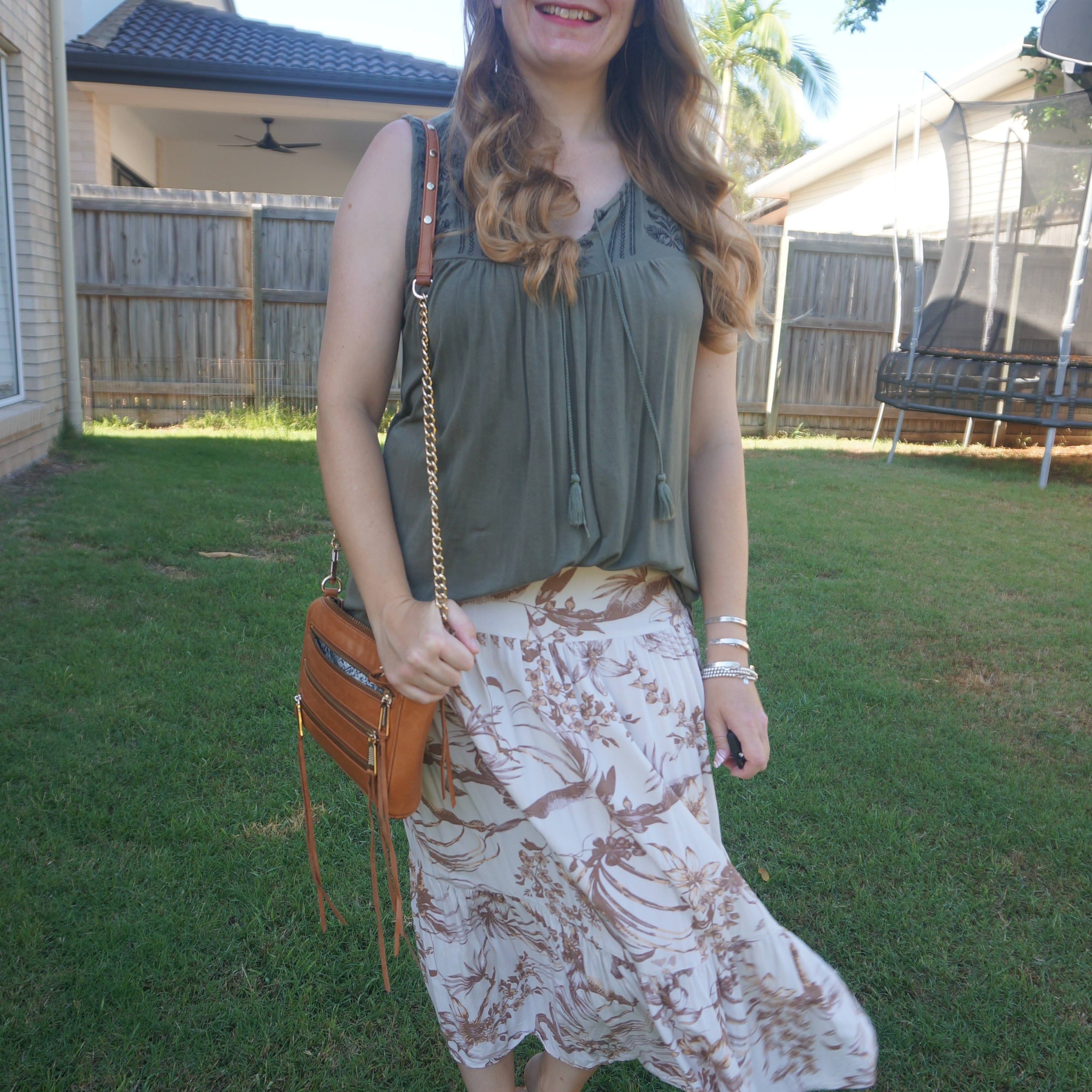 Olive embroidered tank with thrifted brown floral print maxi skirt and tan Rebecca Minkoff mini 5-zip bag 💚

#LTKbag #LTKaustralia #LTKsummer