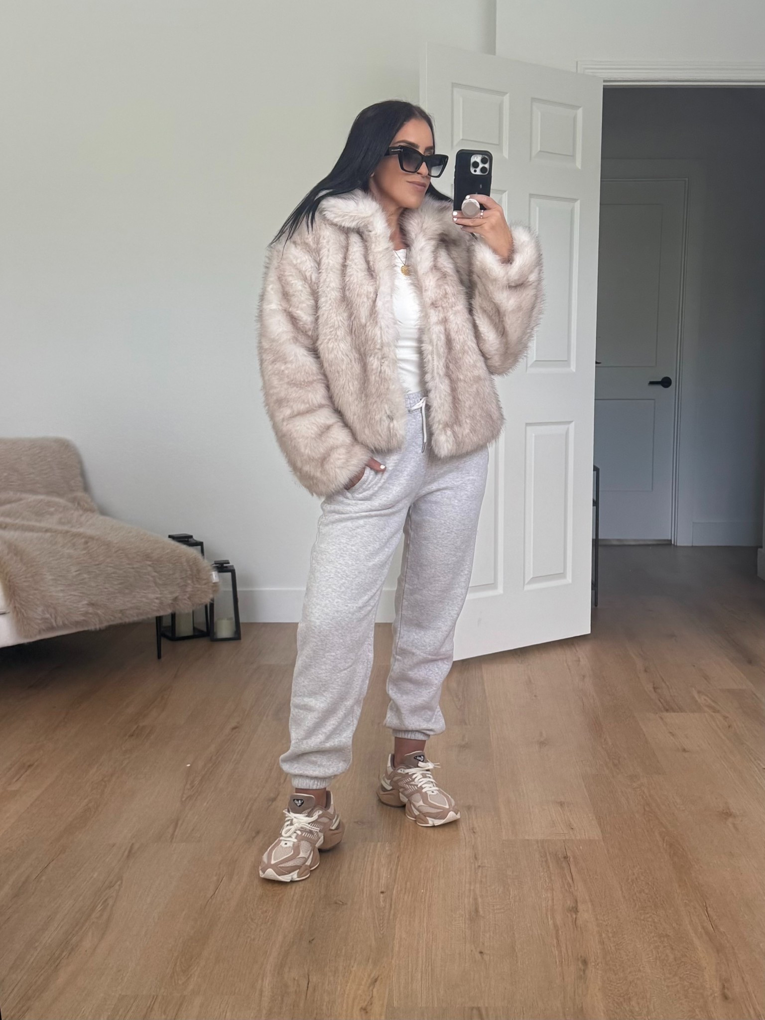 Abercrombie Sunday Sweatpants wearing size small. Time and Tru Women's Long Faux Fur Jacket wearing size medium. New Balance sneakers