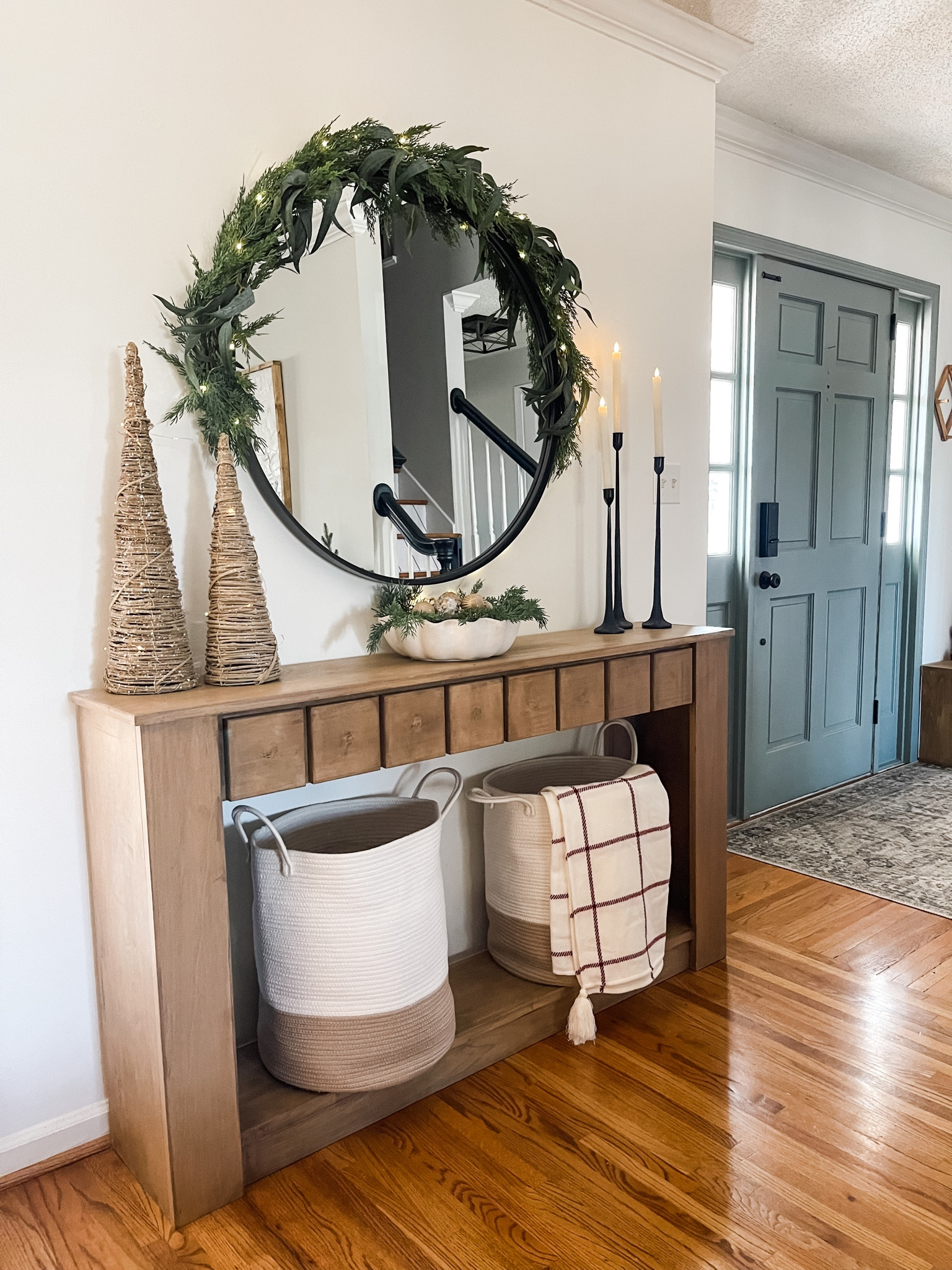 Holiday Decor: ENTRYWAY 

Entry table is a custom made piece.
Cone Trees are from hobby lobby several years ago. 

#LTKSeasonal #LTKhome #LTKHoliday