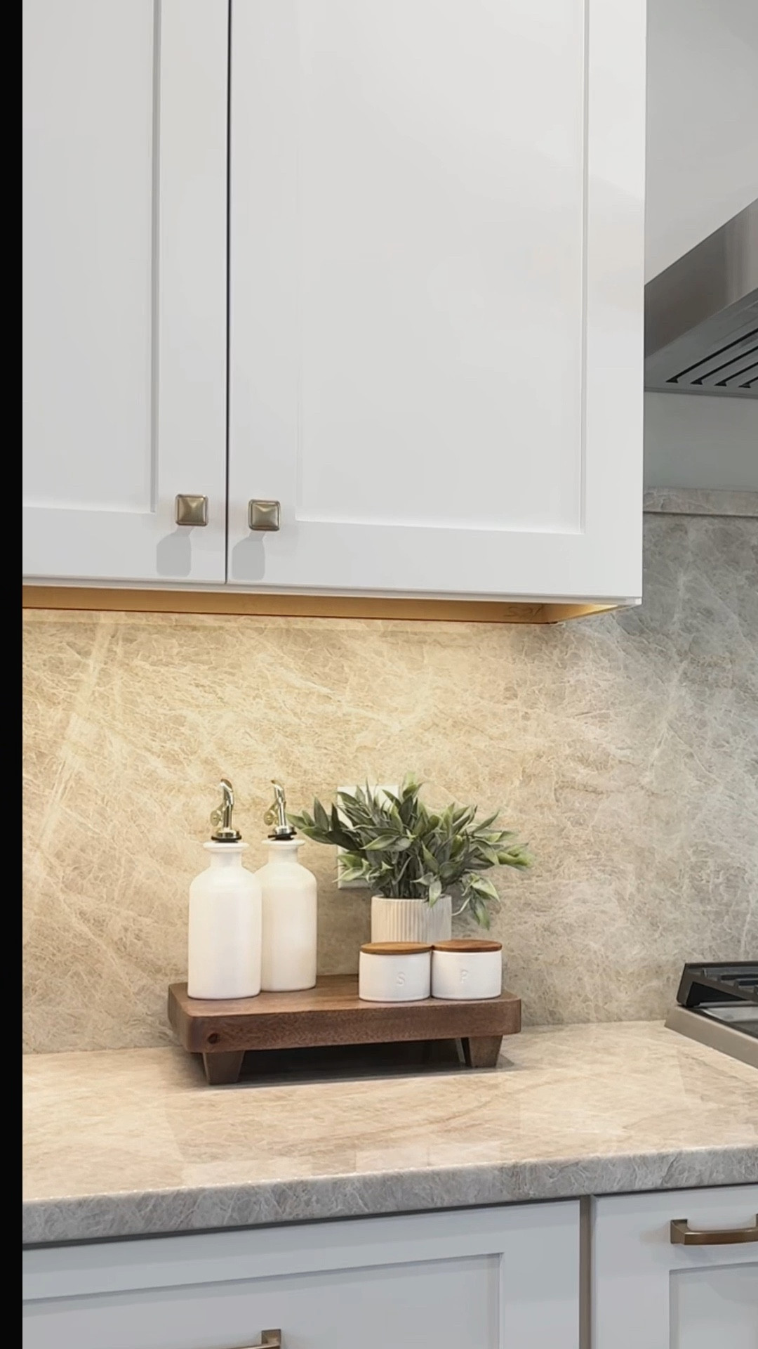 I’m trying to style our spaces with function in mind. I kept it minimal for this cooktop corner — a wooden stand for height, a little greenery for warmth, and the oils + salt and pepper cellars we reach for every day. Simple, useful, and pretty. Everything is linked on LTK 🤍

#LTKHome #LTKFindsUnder50 #LTKdayinmylife
