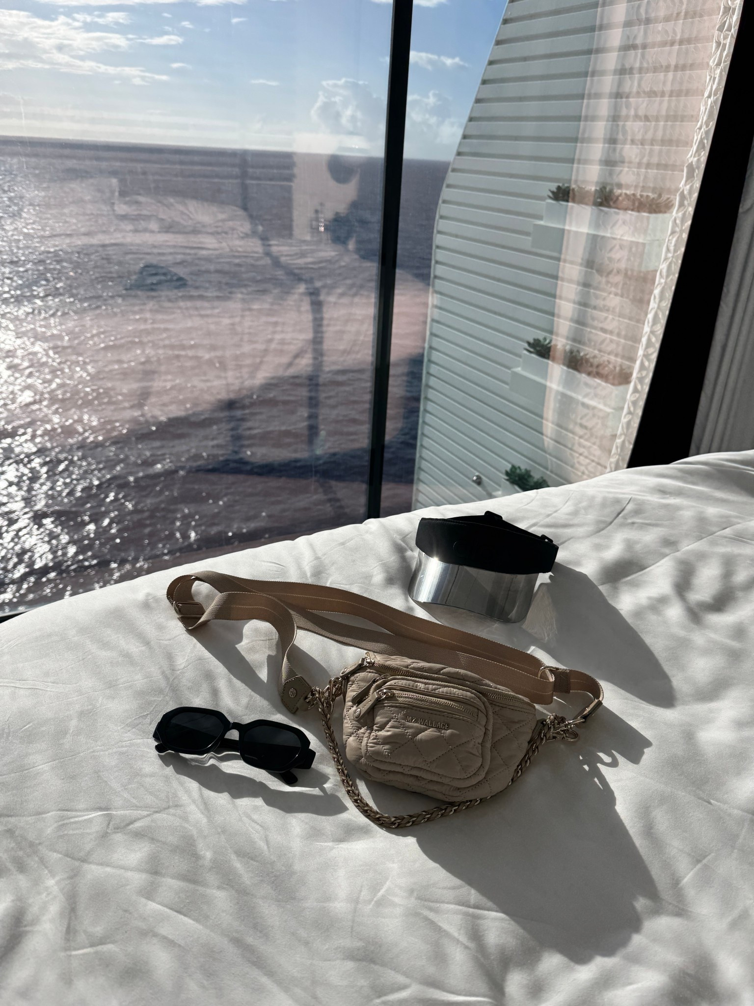 Travel essentials. 
Sun visor
Sunglasses 
Mini bag
Crossbody bag 


#LTKOver40 #LTKTravel #LTKItBag