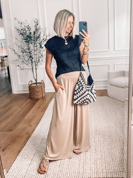 ⭐️ Amazon outfit - I Love everything about this outfit! Wide leg pants are so comfy and have pockets! Top is silky soft with cap sleeves. Wearing a small in both. My new favorite Target sandals are currently on sale! 🙌 Bag is also Amazon 

Outfit ideas 


#LTKFindsUnder100 #LTKFindsUnder50 #LTKOver40