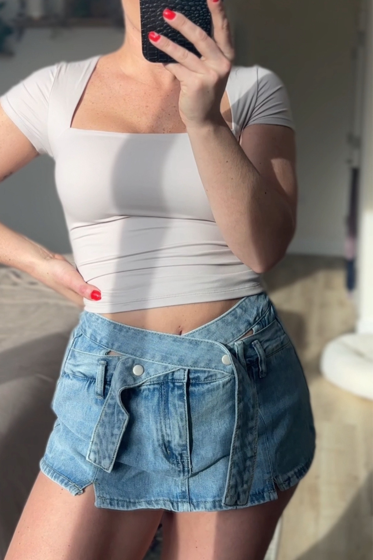 Spring outfit- Denim skirt with shorts underneath and square neck short sleeve top from Amazon- Amazon finds- y2k skirt 

#LTKstyletip #LTKfindsunder50 #LTKSeasonal