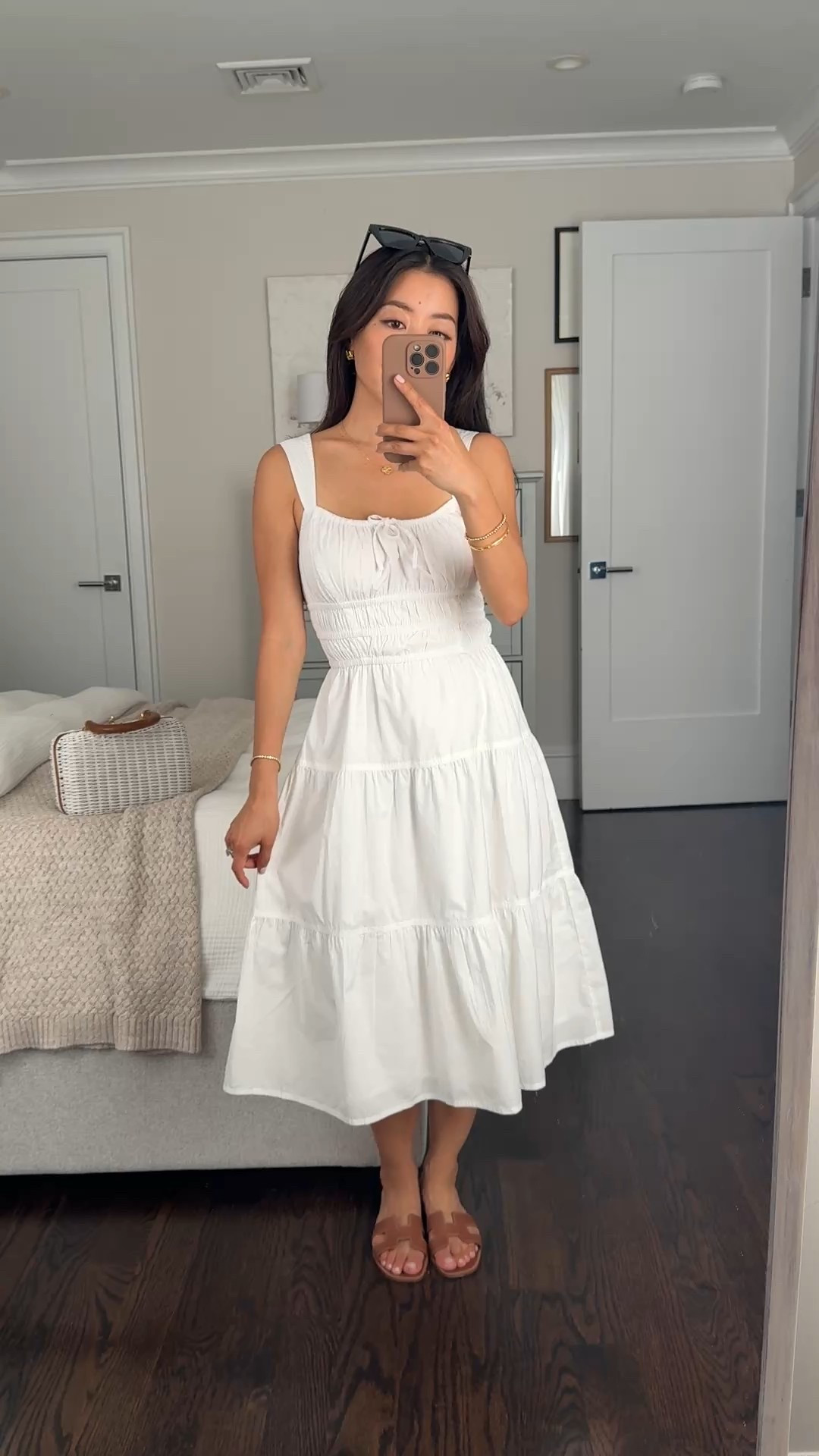Big aritzia sale just started! This is a classic summer dress from them that comes in 3 lengths. 

Also comes in a short sleeve version, and also linen versus cotton. FYI sale items are returnable for store credit or exchanges 

• Martine Poplin midi dress in size XS - comes in mini that’s above knee, midi, and maxi. 

The Xs is well-fitted on me since aritzia sometimes runs small. Midi length is great for petites! I’m 5 feet tall

• Vintage wicker bag

• Hermes sandals

Vacation style, summer dress, white cotton dress, petite friendly brunch outfit #LTKSummerEdit 

#LTKSeasonal #LTKStyleTip #LTKPetite
