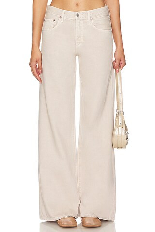 AGOLDE Clara Low Rise Baggy Flare in Tusk from Revolve.com | Revolve Clothing (Global)