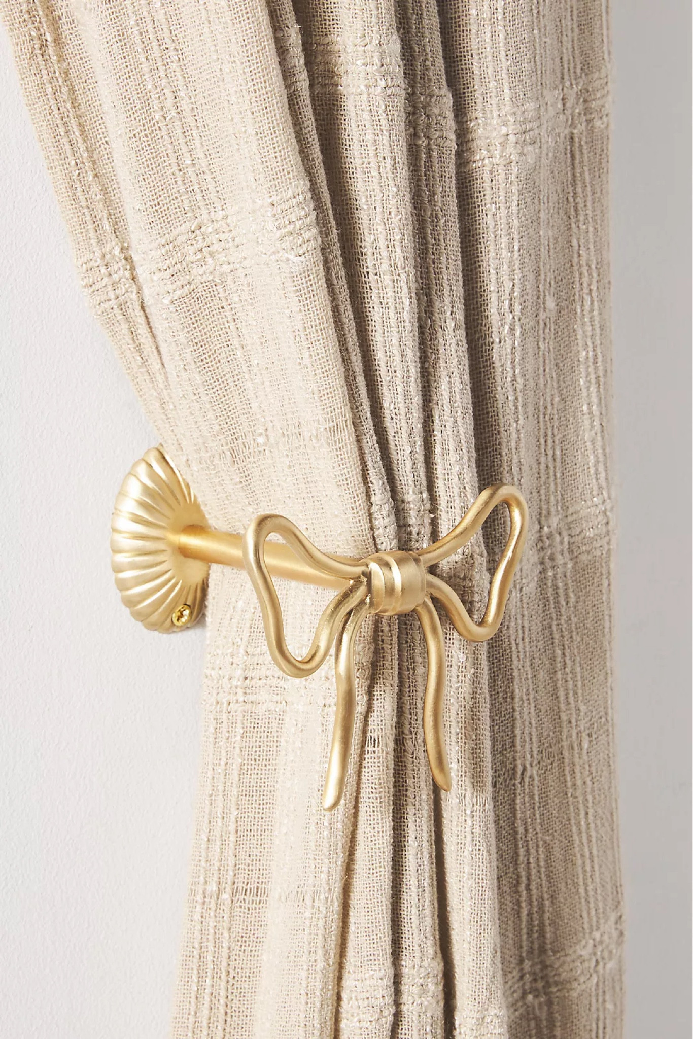 Bow curtain tie backs #babygirlnursery #girlsroom #bows #goldaccents #homedecor #anthropologie 

#LTKhome #LTKkids #LTKbaby