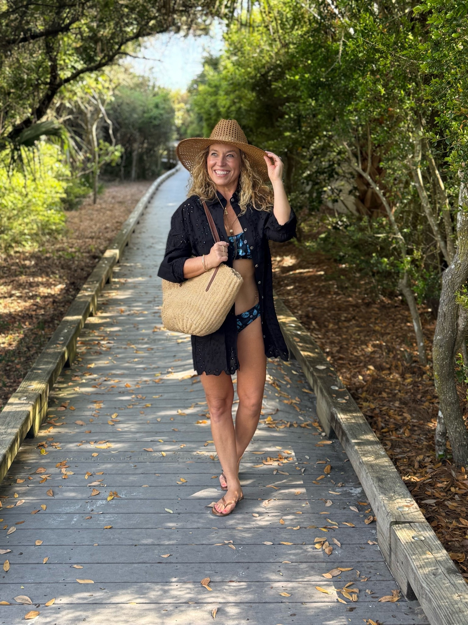 Beach look for 30a!

This swimsuit by Ulla Johnson is perfect for vacation!  The top has ruffle detail and the print is amazing!  The bottoms are medium to full coverage.  I'm wearing a medium.

The shirt is eyelet button down perfect over bathing suit!  Coverup could be worn as a dress because it comes with a slip!  Wearing a small!!

Black eyelet coverup, black shirt coverup, black floral bikini, sandals, beach bag

#LTKOver40 #LTKSeasonal #LTKTravel