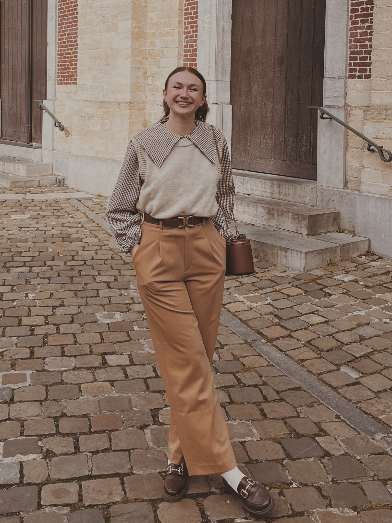 Zara shirt
Zara bag
Beige sweater vest 
Brown pleated trousers 
Belt with buckle detail 

Light academia 
Light academia outfit 
Light academia style 
Light academia aesthetic 
Neutral outfit 
Autumn outfit 
Autumn fashion 
Autumn fashion inspo

#LTKSeasonal #LTKHoliday #LTKOver40