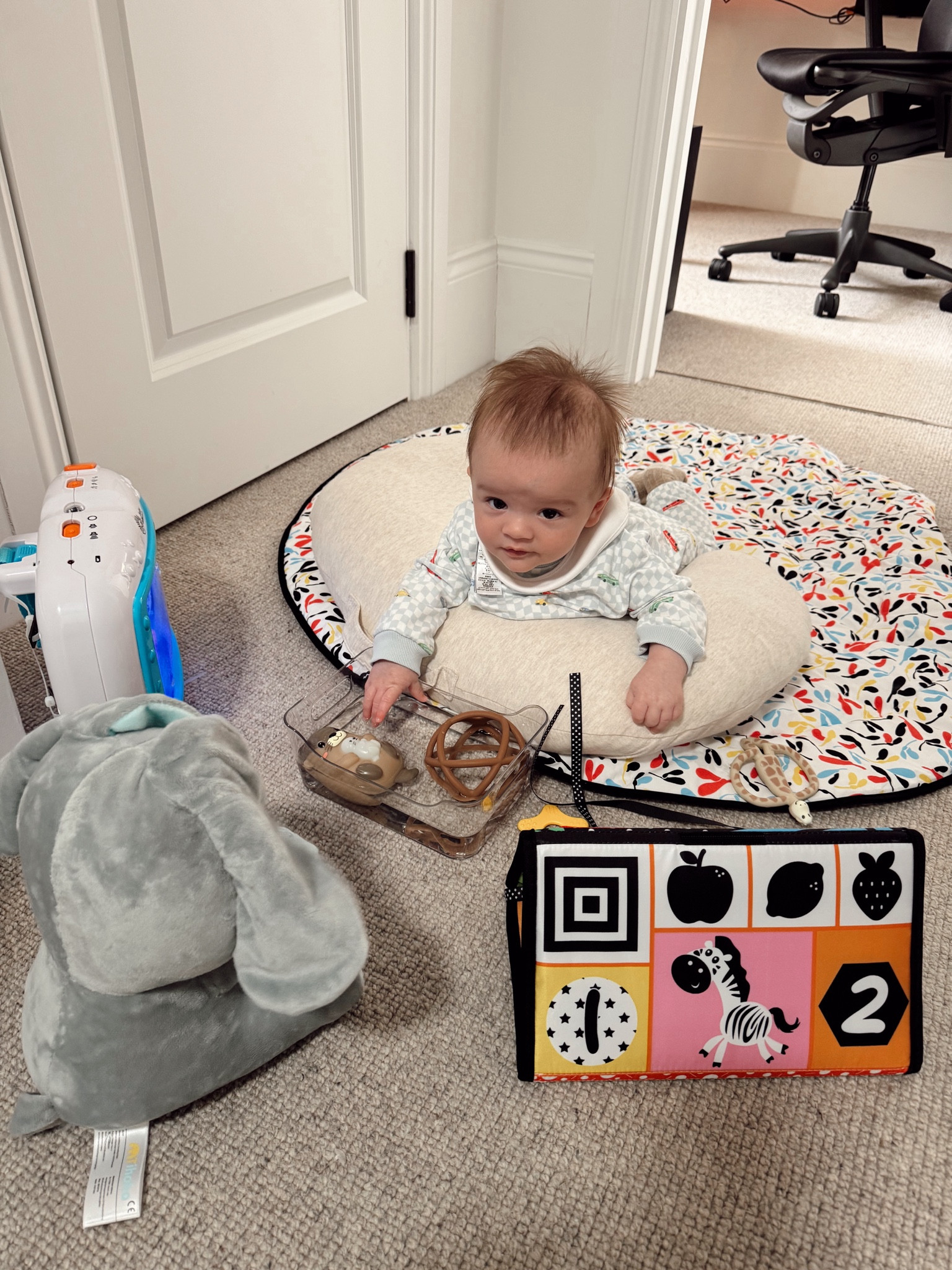 He loves his tummy time! 

#LTKbaby #LTKfamily #LTKmaternity