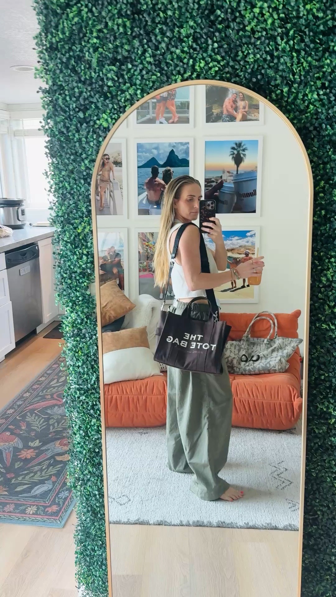Casual and cool. This is one of my favorite outfits for the summertime. The pants are so comfy, I’m in a size XS 120 pounds and 5’4” 
They fit fantastic, I could wear a size small also, but opted for the XS 

￼ I’m wearing a size small and the tank top. This has to be my favorite tank top for the summer as well. It’s breezy, cozy and comfy. All items are tagged exactly as they are. I’ve also tagged a few similar items that I love in the same baggy cropped top.

my tote bag is a size medium and it’s canvas. It holds my 15 inch laptop as well as my large Apple pro max headphones and tripod 

Baggy pants with a cropped top is my go to this season

#LTKootd #LTKTravel #LTKdayinmylife