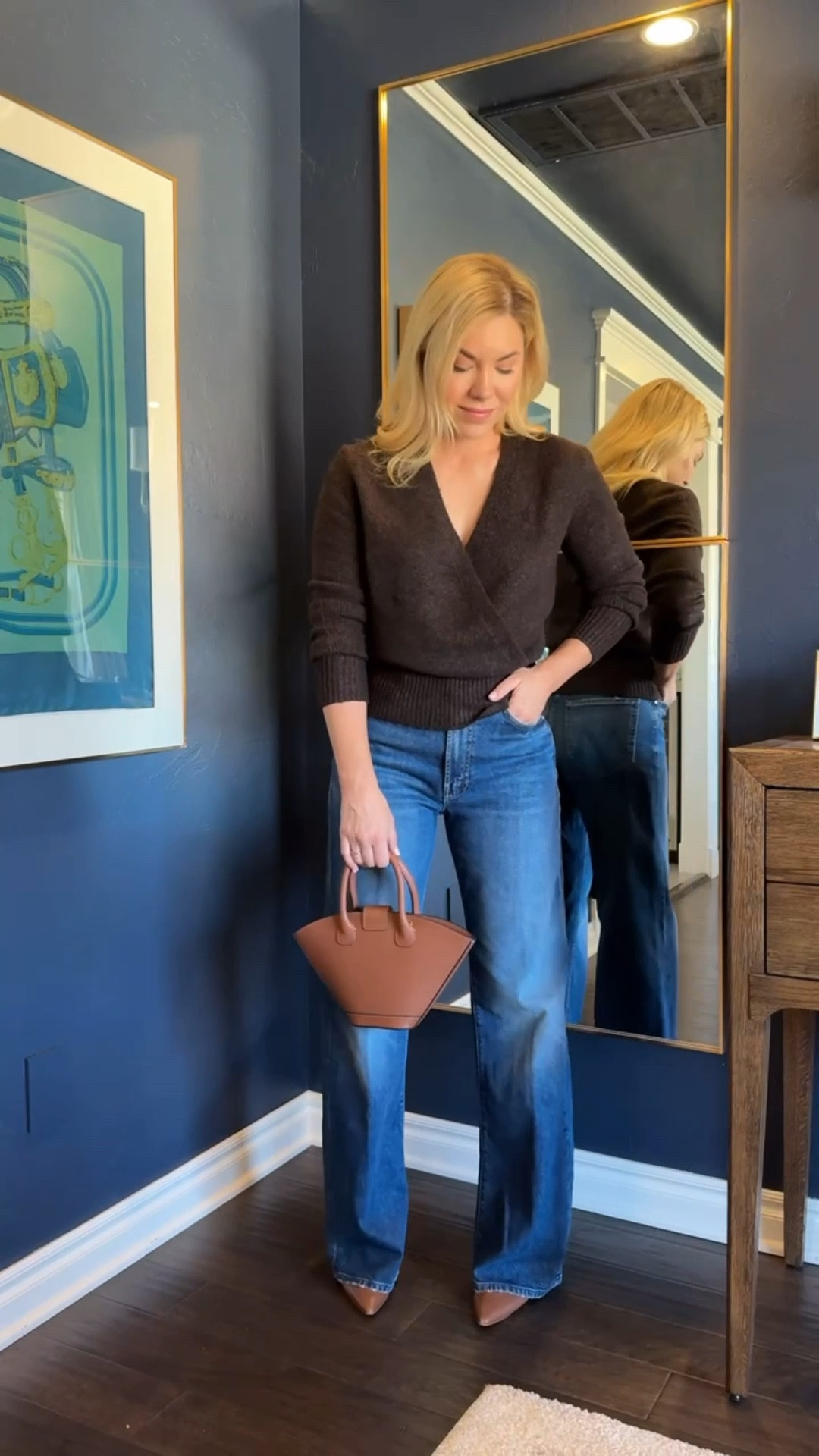 These are a cross between a barrel and wide leg jeans - as far as length I am 5’4 with long legs.

Mother jeans 
Wrap sweater 
Sweater
#LTKFindsUnder100 #LTKSeasonal