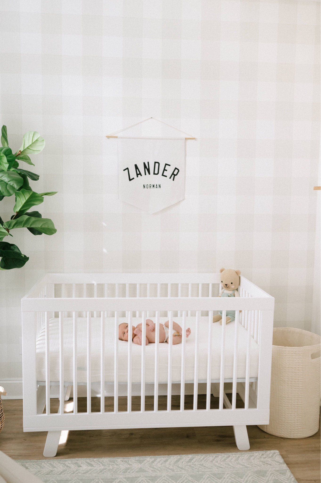 Neutral nursery. Baby boy neutral nursery. Nursery with cream, light green, light wood and white. Neutral baby boy nursery. Nursery with hints of green. Modern baby boy nursery. Nursery with wallpaper. Simple nursery. Clean and light nursery. Checkered wallpaper for baby nursery. Light color wallpaper. Wallpaper for nursery. Neutral wallpaper. Checkered wallpaper  

#LTKbaby #LTKhome