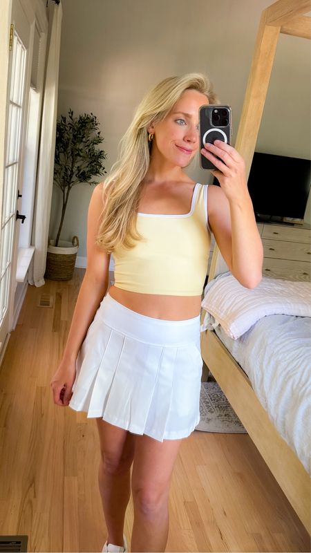 Love this Lilly Pulitzer white tennis skirt and abercrombie tank top abercrombie ypb activewear workout clothes athleisure exercise skirt white sneakers tennis shoes 

#LTKFindsUnder100 #LTKActive #LTKFitness