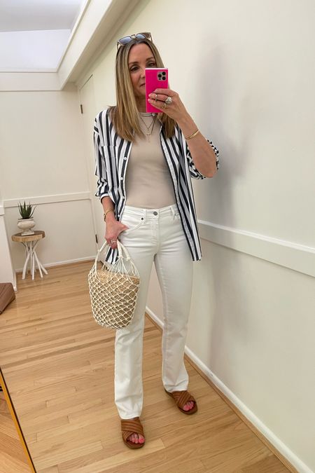 Weekend ootd! Spring outfit, summer outfit, white flare jeans, striped button up, slide sandals

#LTKstyletip #LTKunder50 #LTKSeasonal