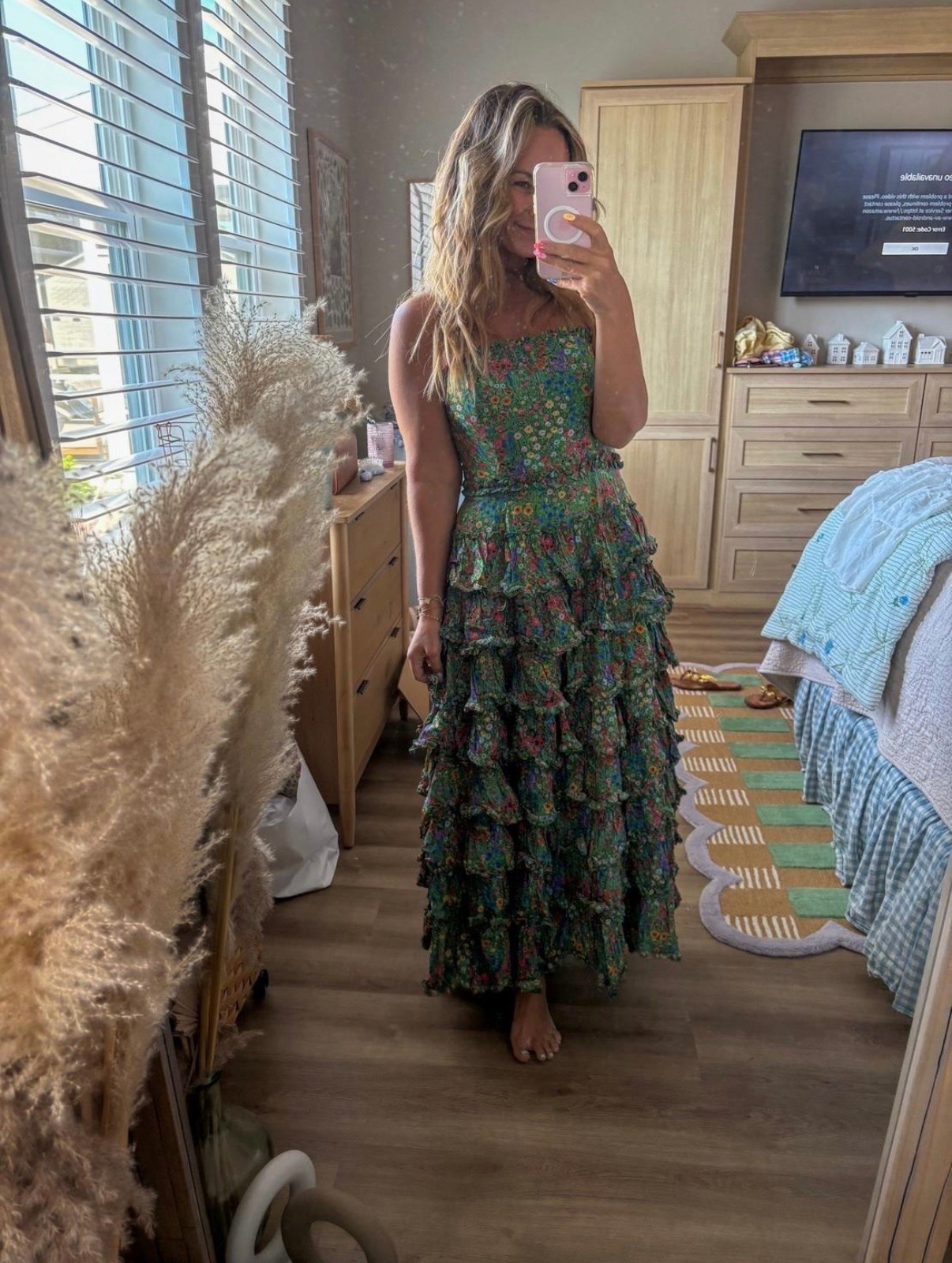 A dress that does all the talking 💚🌸 This tiered floral maxi is equal parts romantic and statement-making. Perfect for weddings, vacation dinners, baby showers, garden parties, or anytime you want to feel effortlessly beautiful. Just add simple sandals and let the dress shine. 

floral maxi dress, tiered maxi dress, strapless dress, wedding guest dress, garden party dress, vacation dress, resort wear, romantic style, ruffle dress, feminine fashion, summer event dress, colorful floral dress, boutique style.