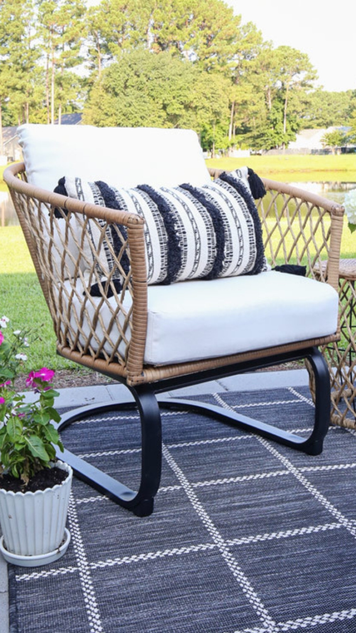 Wicker outdoor chair set with matching side table, plaid outdoor rug, textured throw pillow with tassels

#LTKHome #LTKSaleAlert #LTKSeasonal