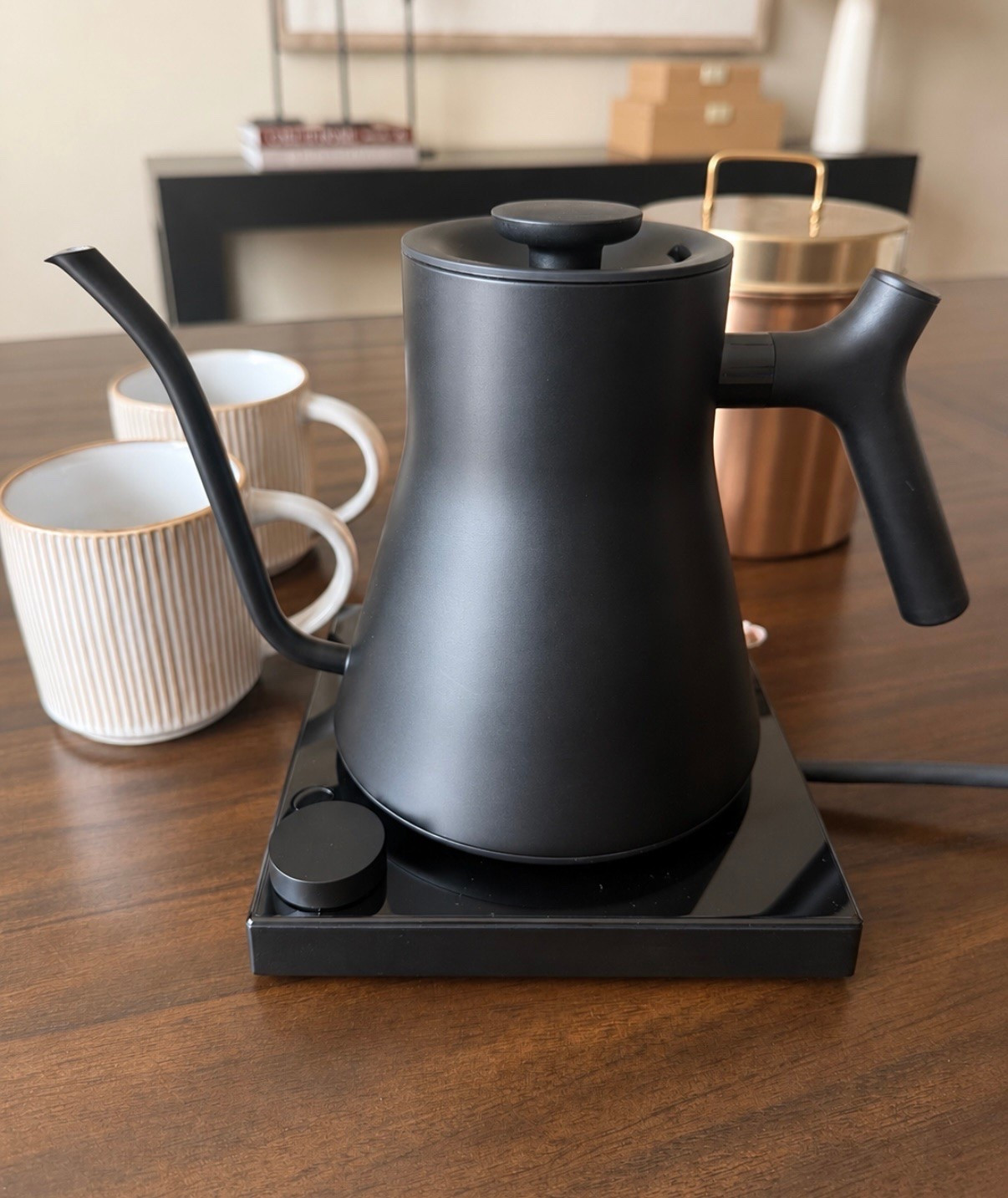✨☕️ coffee bar upgrade I’m really loving lately 🙌

this matte black pour-over kettle honestly makes a kitchen counter or coffee station look so elevated 🖤

✔ exact temperature control down to the degree
✔ quick heat time
✔ precision pour spout for coffee + tea
✔ keeps water warm up to 60 mins
✔ built-in brew timer
✔ schedule feature
✔ preset guide modes for different drinks
✔ matte black modern design that honestly doubles as decor ✨

it also has thousands of great reviews for performance, heating speed, and aesthetic appeal 👏

such a pretty functional piece if you love that clean luxury kitchen aesthetic ☕️

#LTKdayinmylife #LTKmomlife #LTKmorningroutine