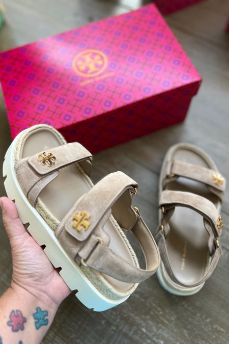 Tory Burch - Day-to-evening wearability combines a practical silhouette with elevated details. Our Kira Rope Sport sandal offers a textured take on summer elegance with mixed materials, pairing suede straps with a jute-lined midsole. The ultra-comfortable molded leather footbed is set on a sawtooth rubber sole and utilitarian velcro straps are detailed with our signature logo. 

#LTKShoeCrush #LTKMidsize #LTKOver40

#LTKSwim #LTKStyleTip #LTKTravel