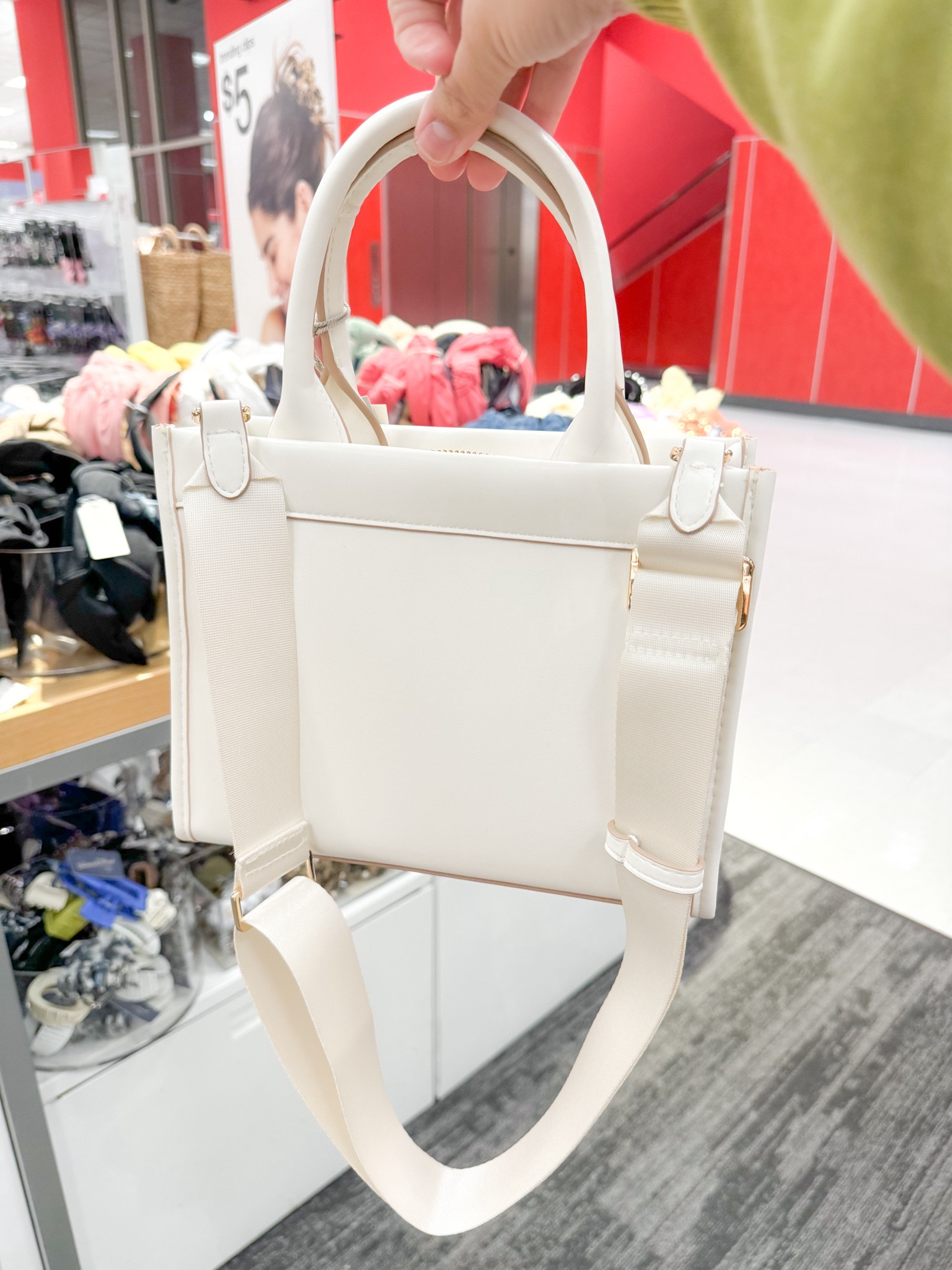 from the target app:

Freshen up your accessories collection with the Small Boxy Tote Handbag from A New Day™. Designed in a boxy style, this structured tote handbag comes with interior and exterior pockets to help keep your phone and other items separately organized. This woven tote handbag comes with double handles, and an adjustable strap for easy carrying.

#LTKfindsunder50 #LTKitbag #LTKstyletip