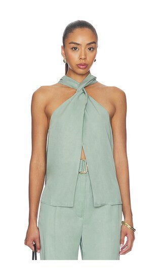 MATTHEW BRUCH Twist Halter Top in Teal. - size S | Revolve Clothing (Global)