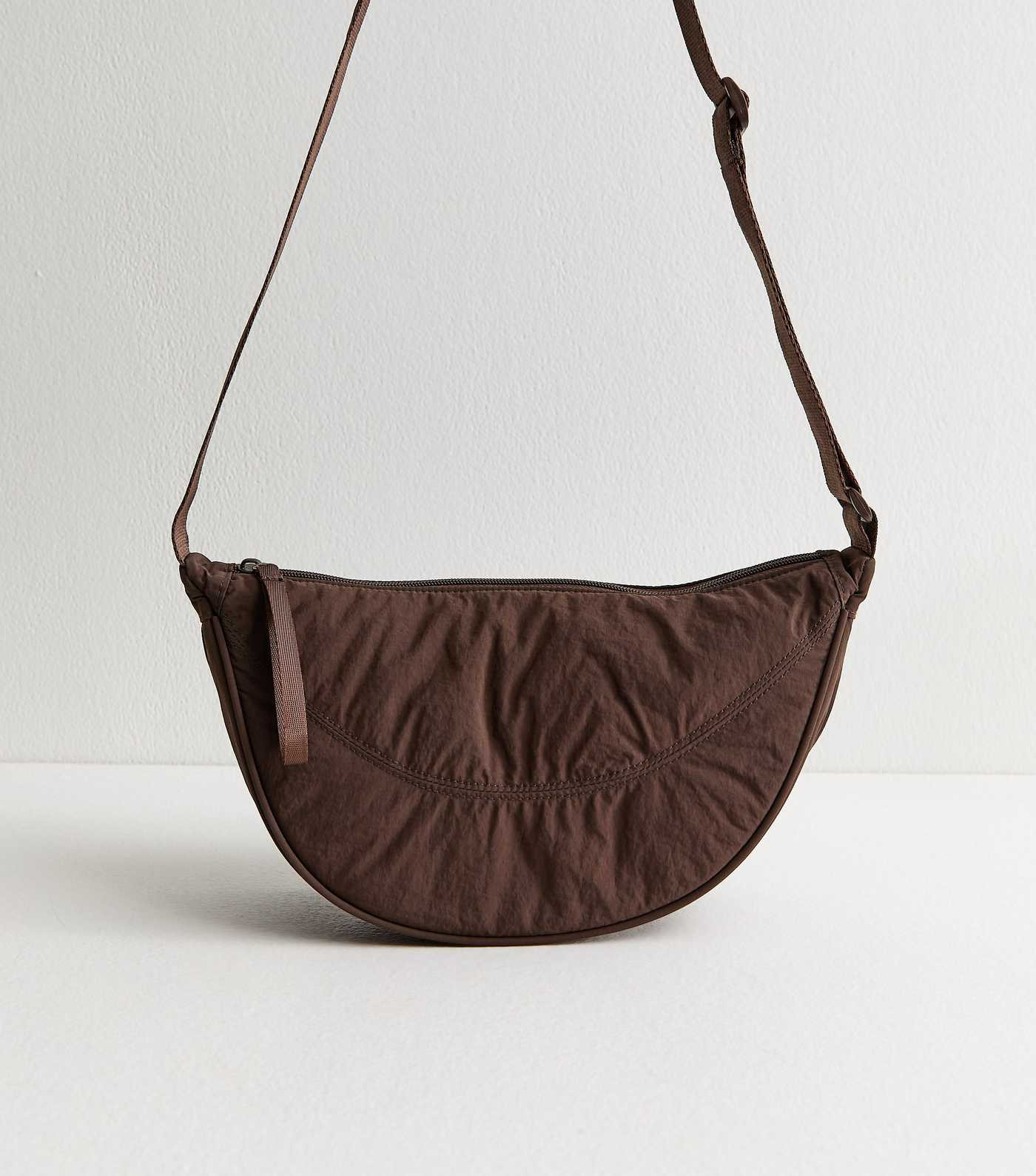 Dark Brown Plain Curved Crossbody Bag | New Look | New Look (UK)