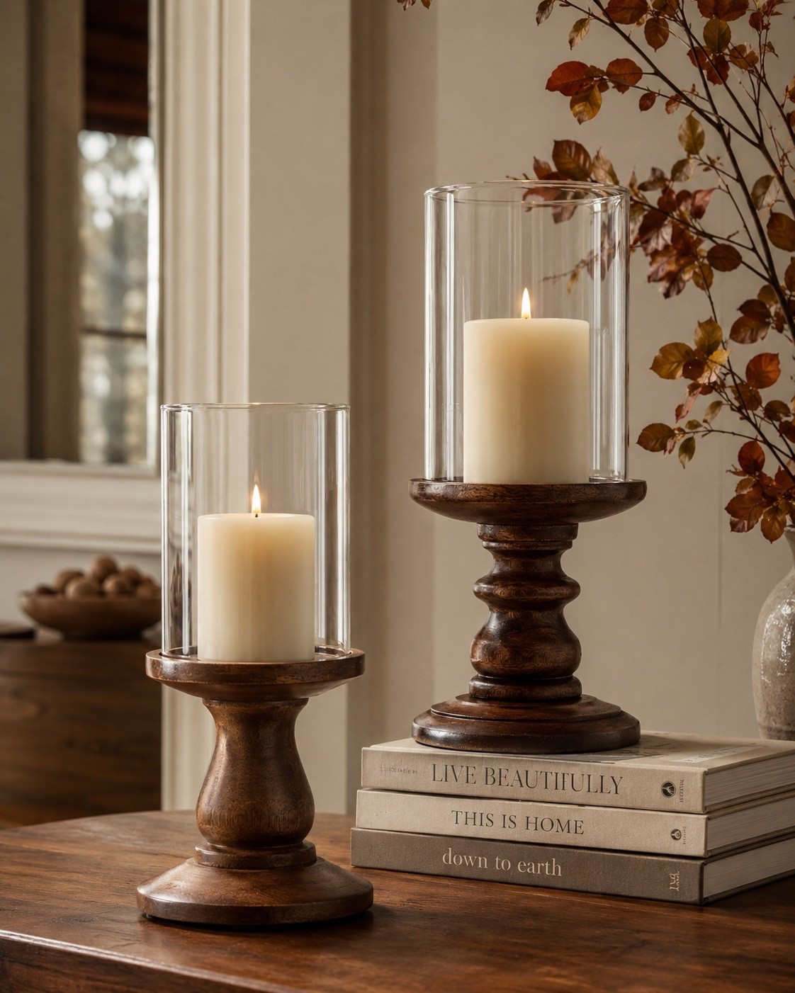 Fall home decor that instantly makes a space feel warm + cozy. 🍂🤎 These My Texas House wood hurricane candle holders are such a pretty way to add height and warmth to an entryway table, mantel, console table, or fall centerpiece. I love the rich wood tones paired with the glass hurricanes — timeless enough to use year-round, but SO good for cozy fall decorating.

#LTKHome #LTKSeasonal