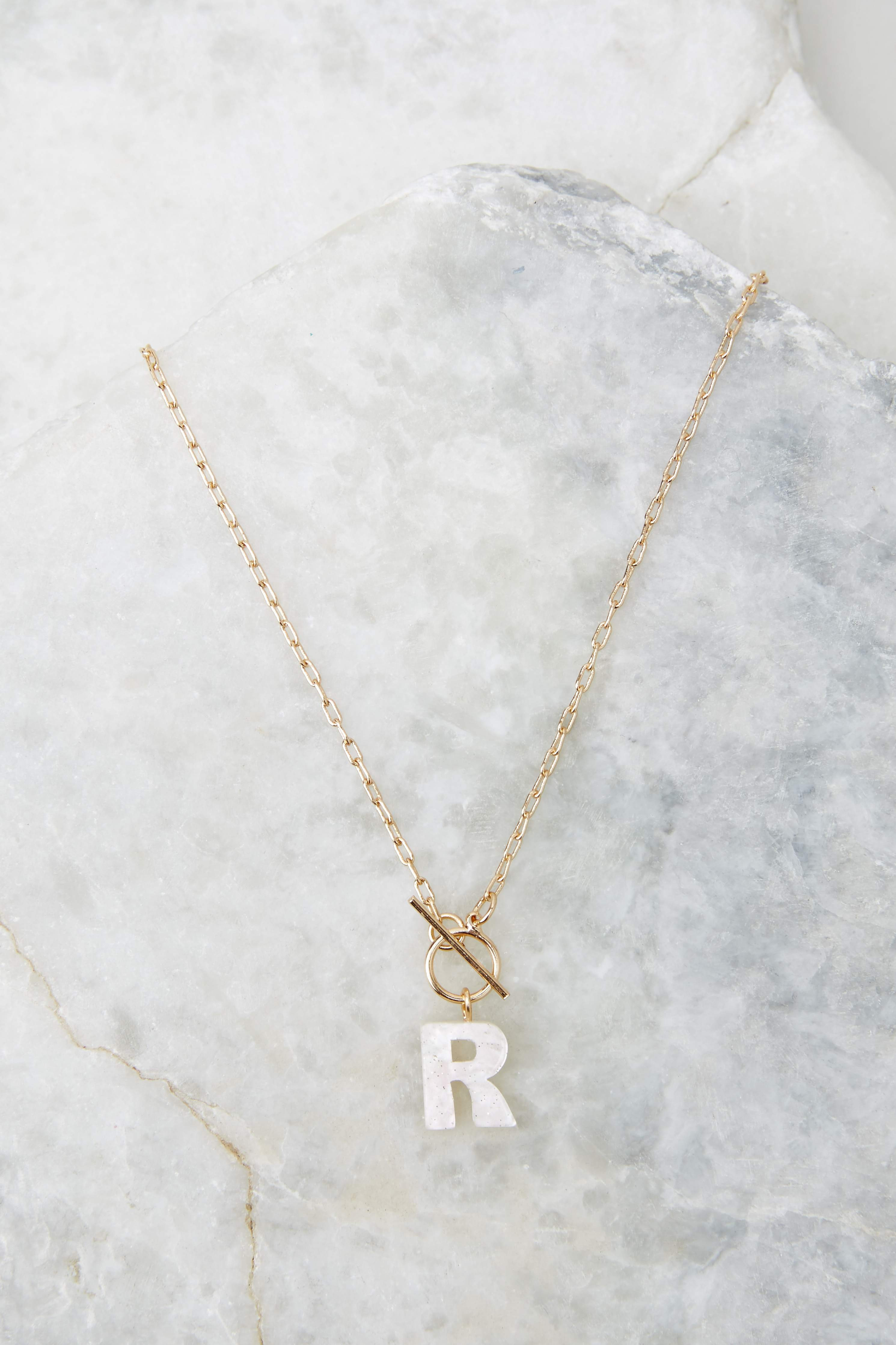 A Matter Of Perspective Initial R White Acrylic Necklace | Red Dress 