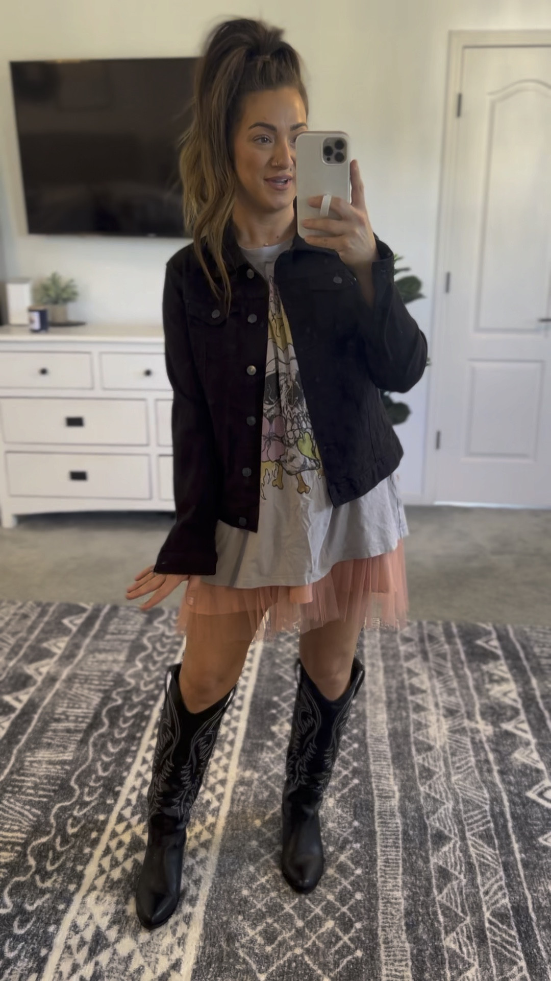 Here for this tulle skirt under the long graphic tee trend!! 😍 I sized up in the graphic tee to size XL for a really oversized fit. Use the promo code to grab it at 25% off!  Size up half in the boots 👍 

#LTKSeasonal #LTKSale #LTKstyletip