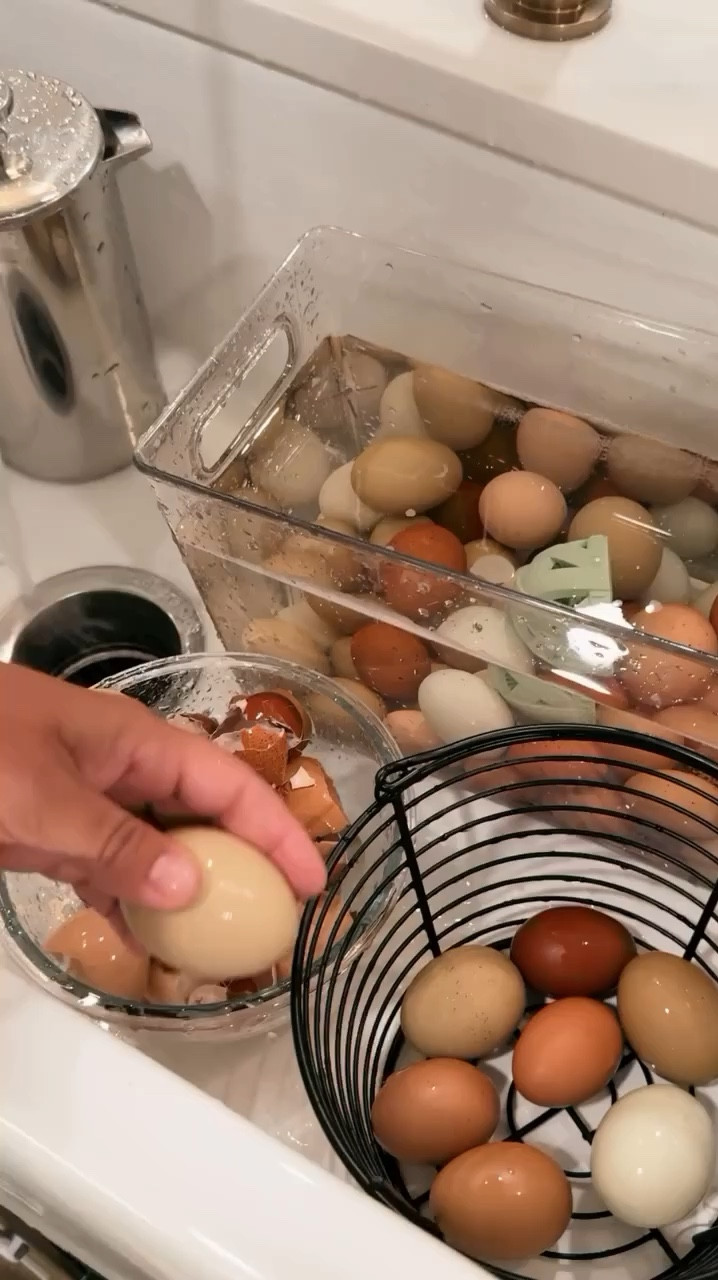 Hi my name is Cristin & my 10 year old taught me how to boil eggs. I just need to share.
• Boil water.
• Lower eggs into the boiling water with a ladle.
• Let the eggs stay in a roiling boil for 12 minutes.
• Transfer immediately to a bowl filled with ice water (using that ladle again).
• Let the eggs sit in the ice water for 5 minutes.
• Crack and be amazed.
We save the shells, let them dry & then throw in a blender & grind into a powder. For planing and for the chickens

#LTKHome #LTKFamily