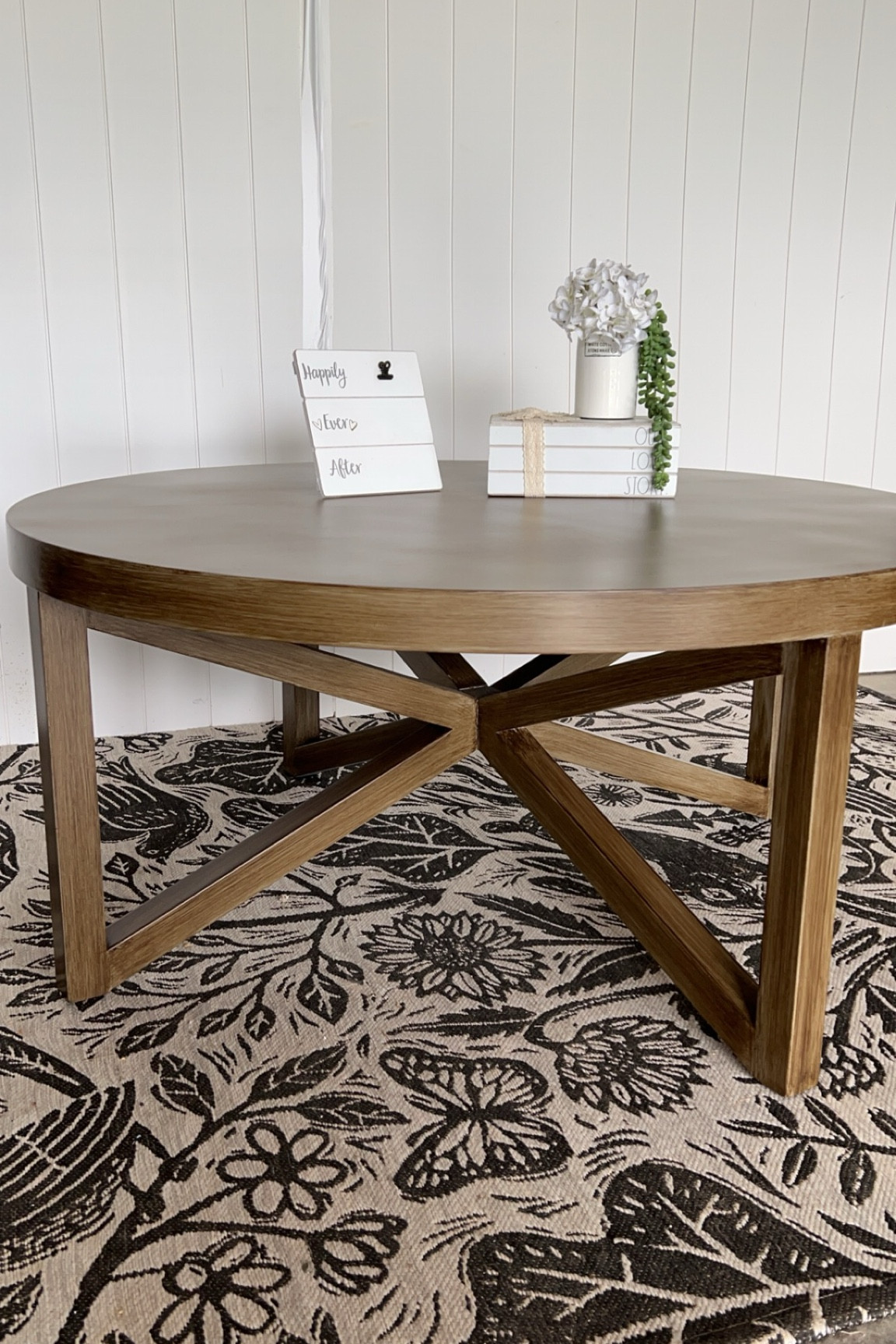 I used a Zinser 1-2-3 primer in grey as the base and then Rustoleum Glaze in Java Brown. Paint on with a brush, wipe it back with the deck brush, then use the little blue broom to make the textured look  

#LTKHome #LTKU