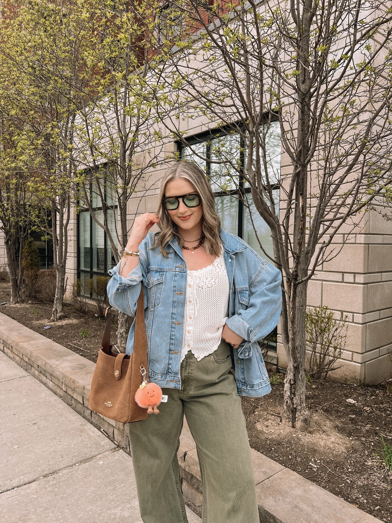 Simple spring outfit! Wearing my usual size L in the crochet tank top, Canadian link under “similar products”. Wearing 32 long in the jeans for a looser fit, and I cut the hem for a custom length. Sized up to XL in the denim jacket for an oversized fit. New Balance sneakers are so comfy but run a little big, I’m a 9.5-10 and wear a 9

#LTKjeans #LTKmidsize #LTKstyletip