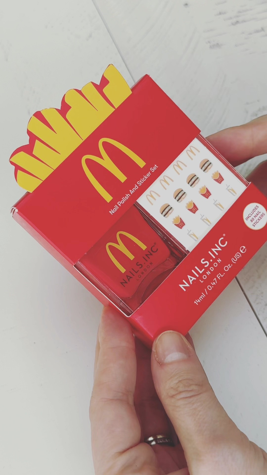 Red nail varnish one coat 