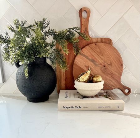 Kitchen styling, kitchen decor, wood cutting board, magnolia book, white bowl, gold figs, black vase, pine stems, home decor

#LTKFind 

#LTKfindsunder50 #LTKhome #LTKMostLoved