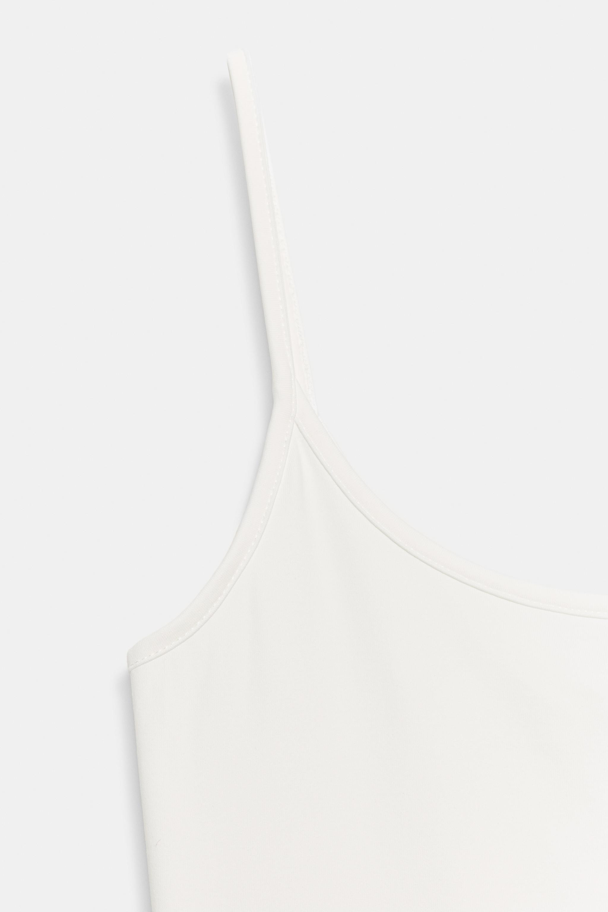 MID WEIGHT - SLIM FIT - ROUND NECK - REGULAR LENGTH - SLEEVELESS. Slim-fit tank top made from a p... | Zara US