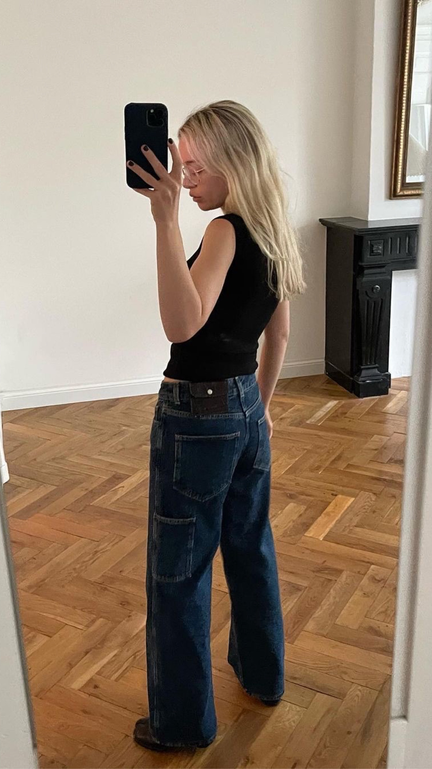 Casual but chic 

Wearing the jeans in a size XS (they fit smaller to size). 

outfit inspiration, summer style, black sleeveless tank top, Agolde, Maison Margiela, tabi split god leather ballet flats, net a porter, wide leg jeans, Ssense, Matches Fashion, Luisaviaroma, Farfetch, Saks Potts, Netherlands. 

#LTKeurope #LTKSeasonal #LTKstyletip